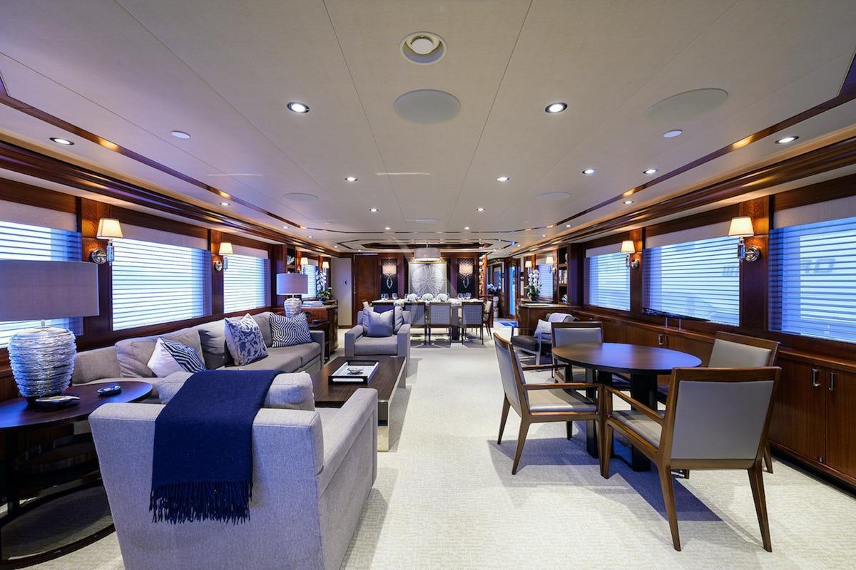 a living room with a couch and a table aboard LADY JJ Yacht for Charter