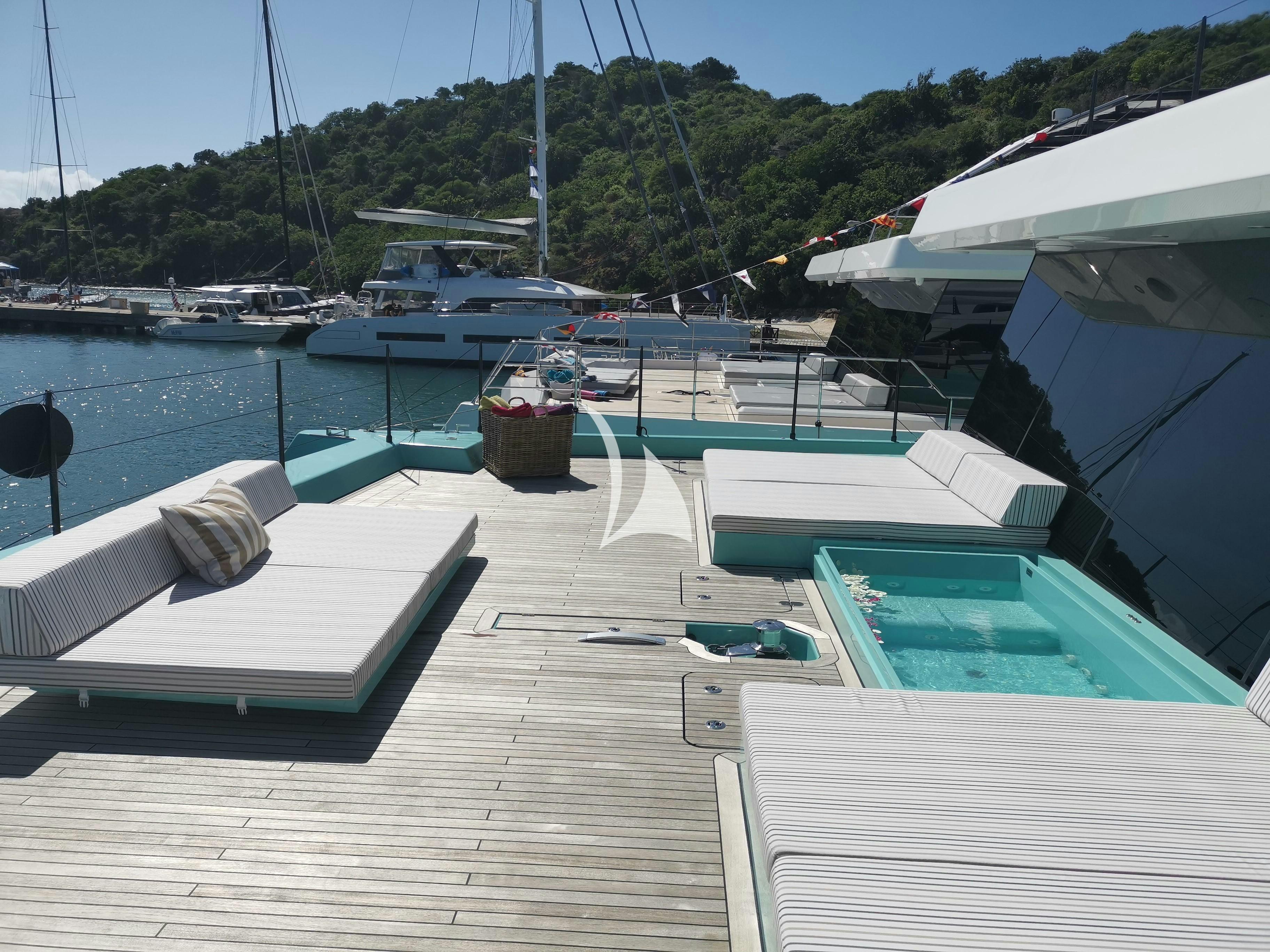 a deck with many boats aboard CHRISTINA TOO Yacht for Sale