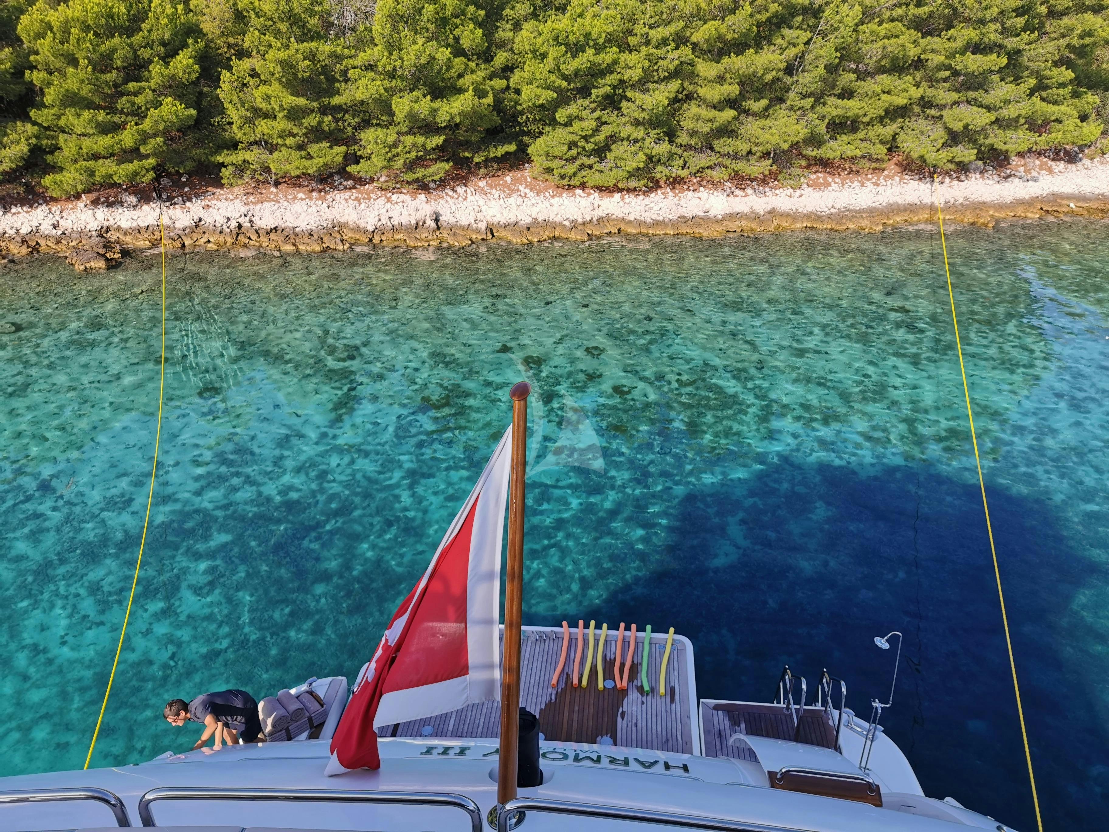 a boat on the water aboard HARMONY III Yacht for Charter