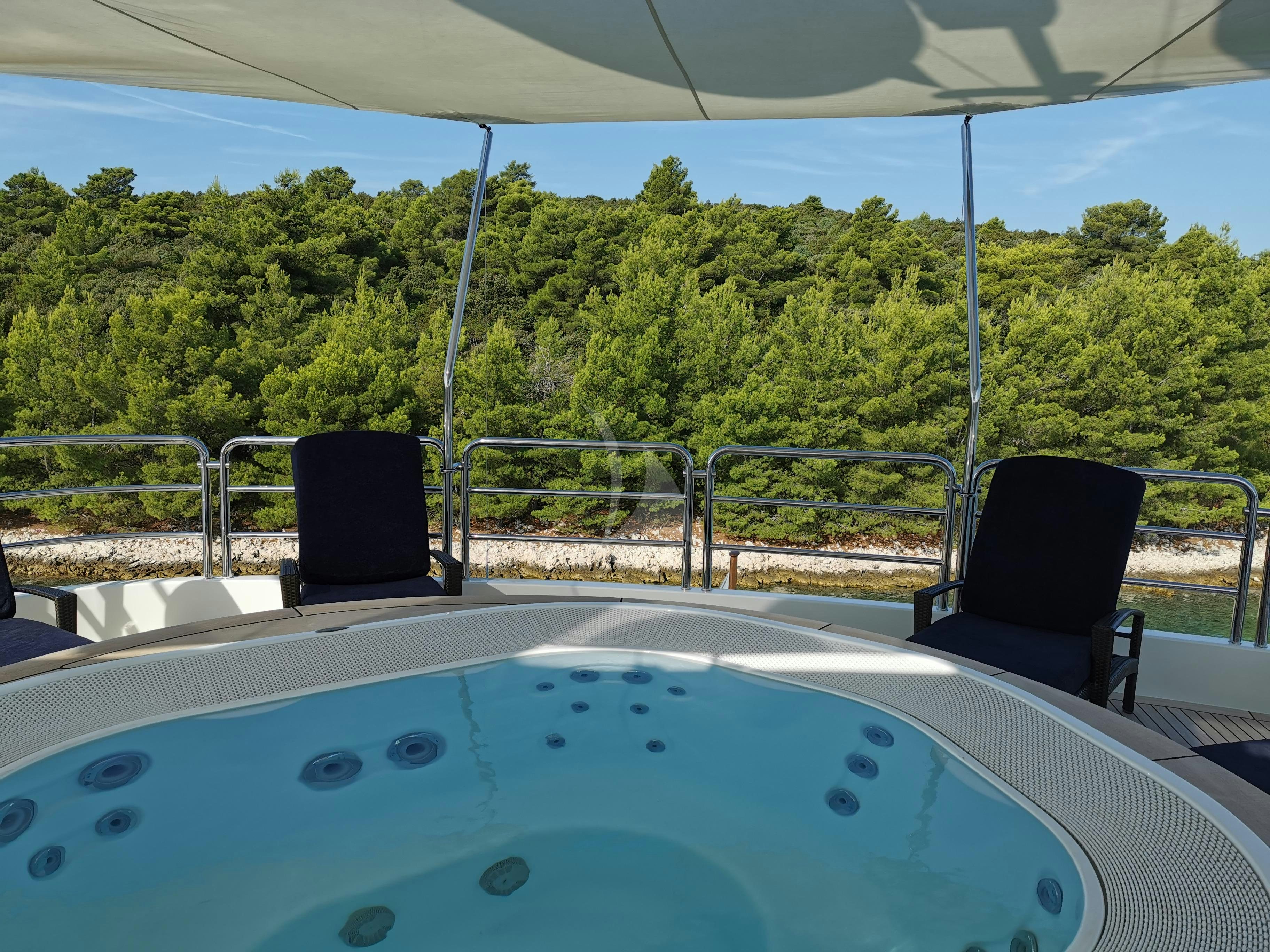 a chair on a boat aboard HARMONY III Yacht for Charter