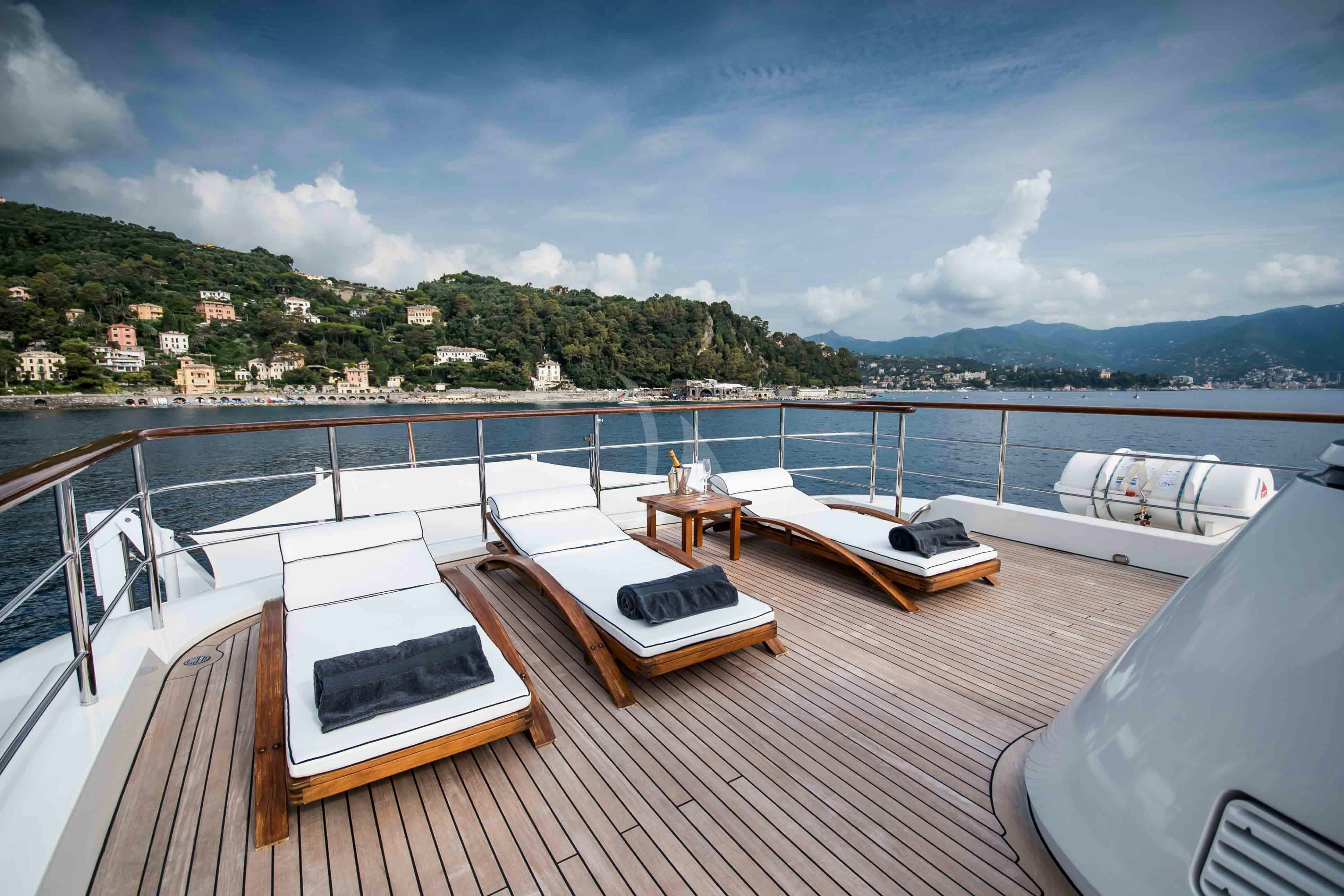 a deck with a view of a city and water aboard ELENI Yacht for Charter