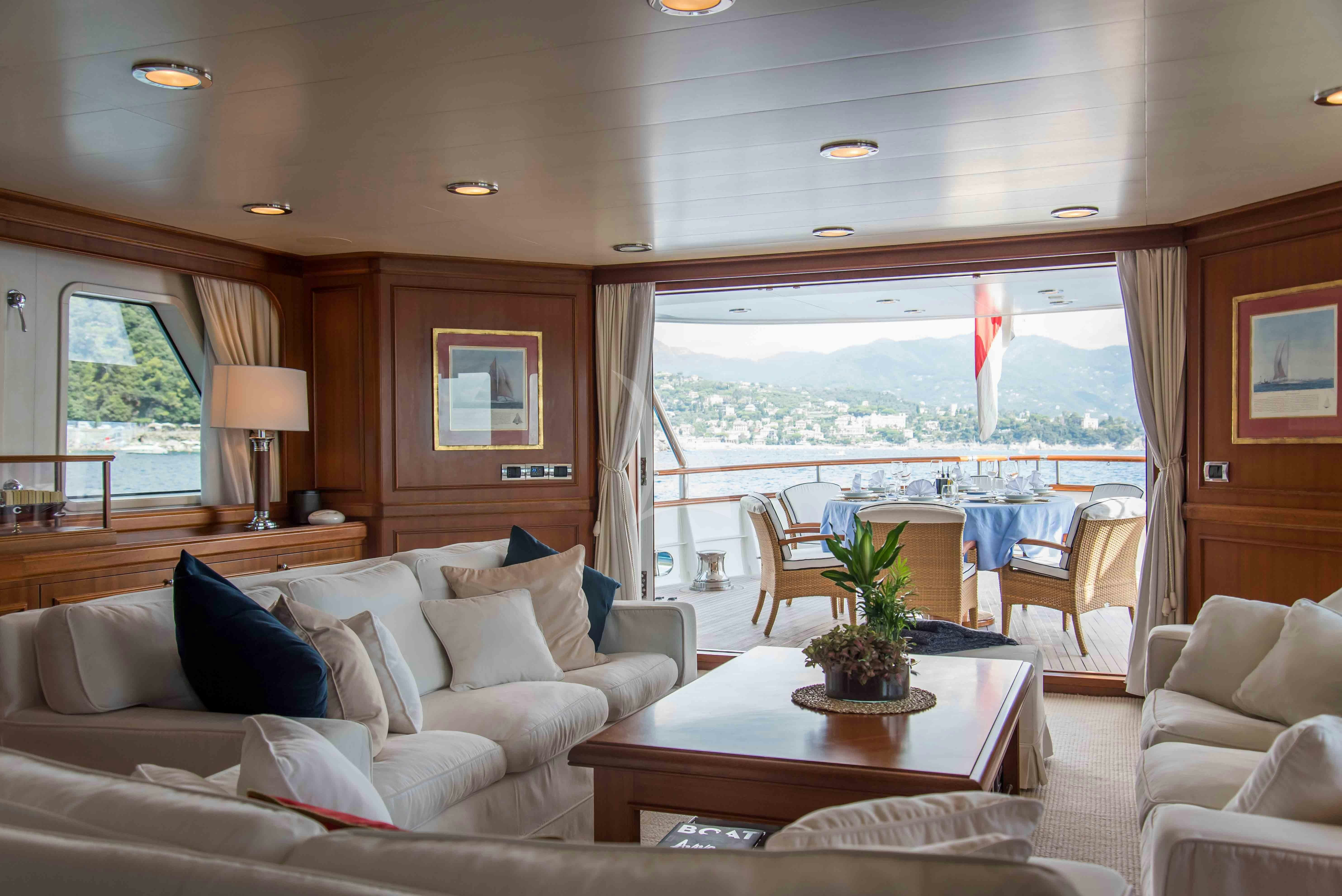 a living room with a large window aboard ELENI Yacht for Charter