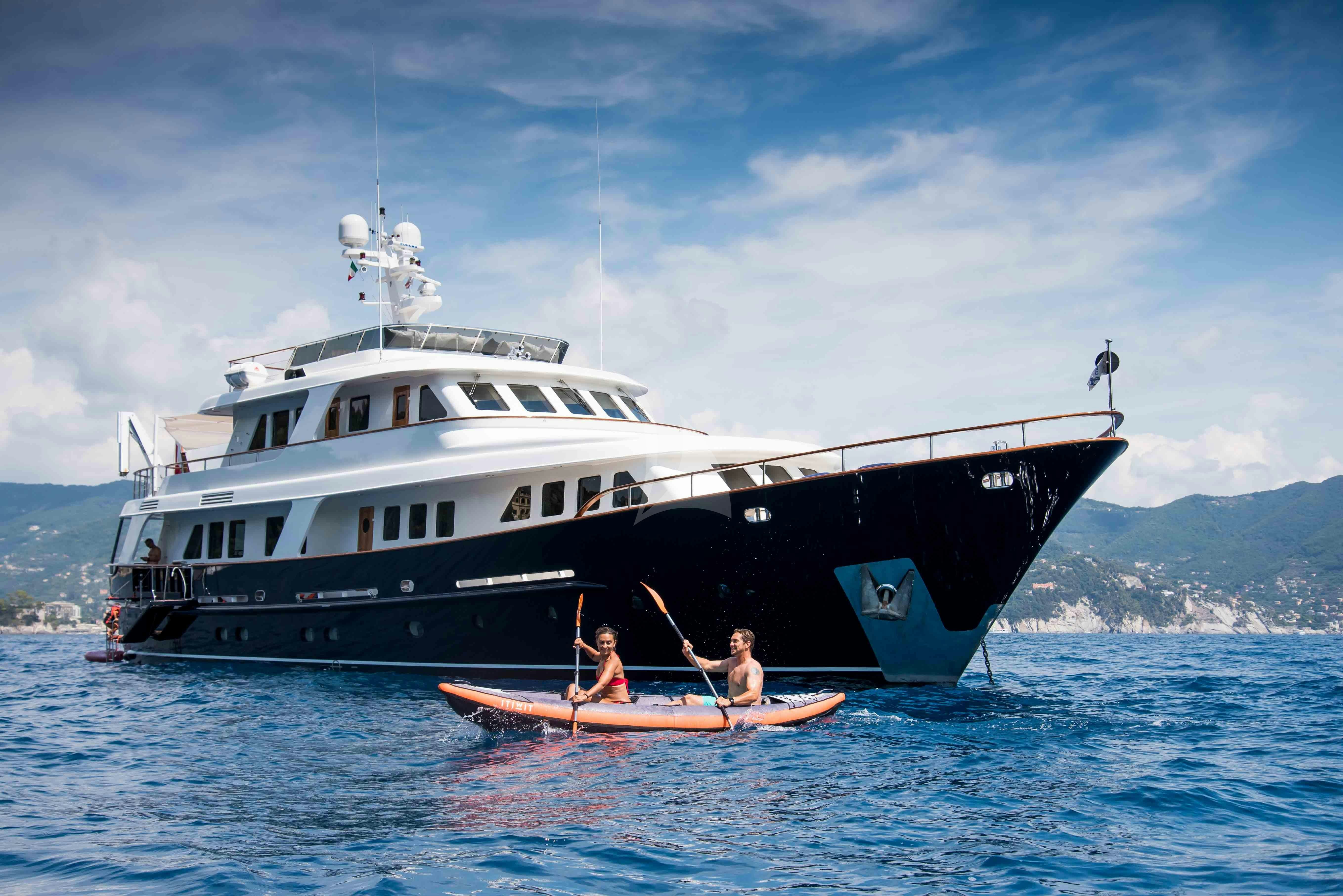a boat with a couple of people in it aboard ELENI Yacht for Charter