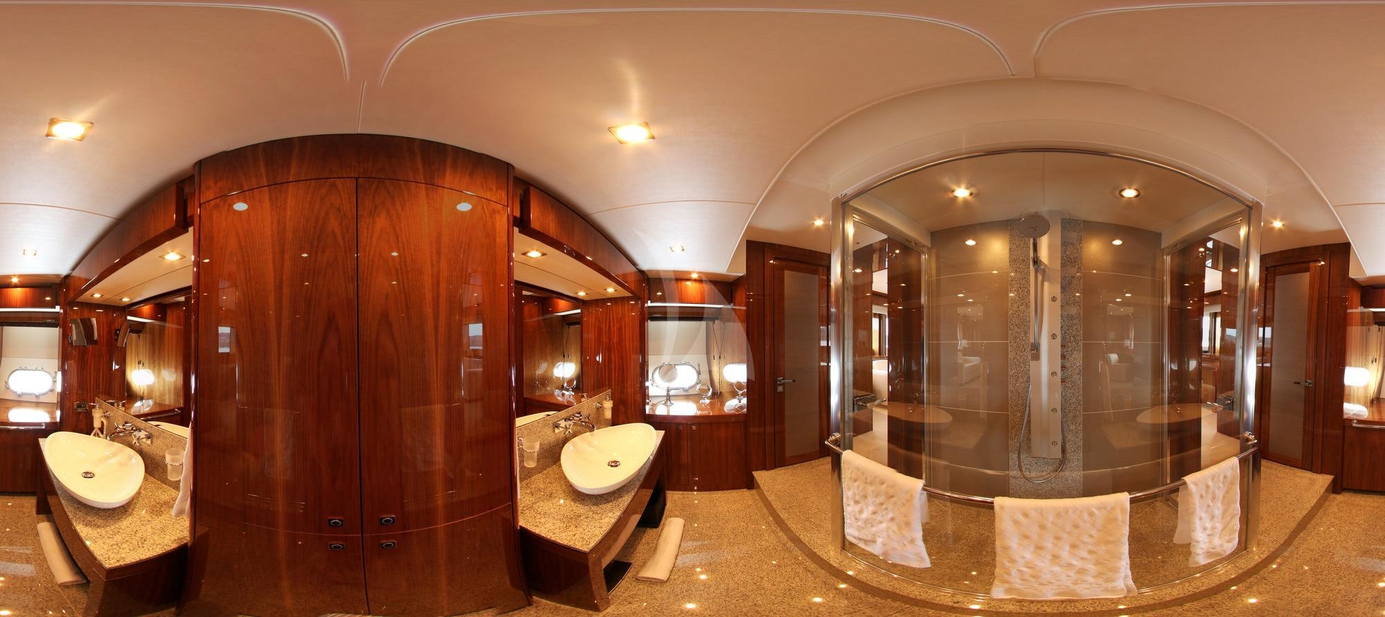 a fancy bathroom with a large glass shower aboard MAORO Yacht for Charter
