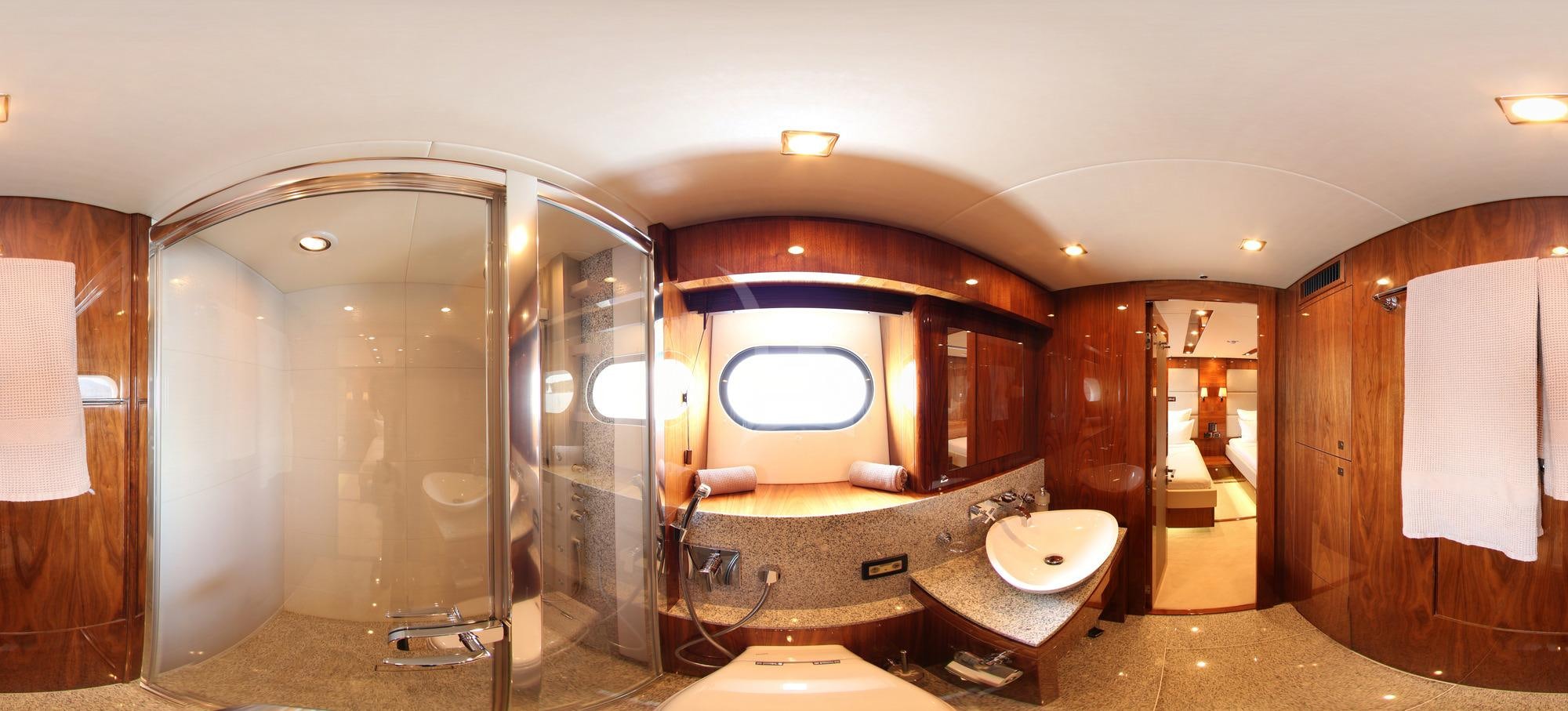 a bathroom with a large shower aboard MAORO Yacht for Charter