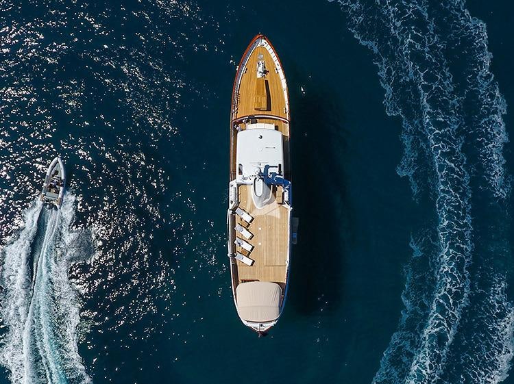 a white and orange boat in the water aboard HEAVENLY DAZE Yacht for Charter
