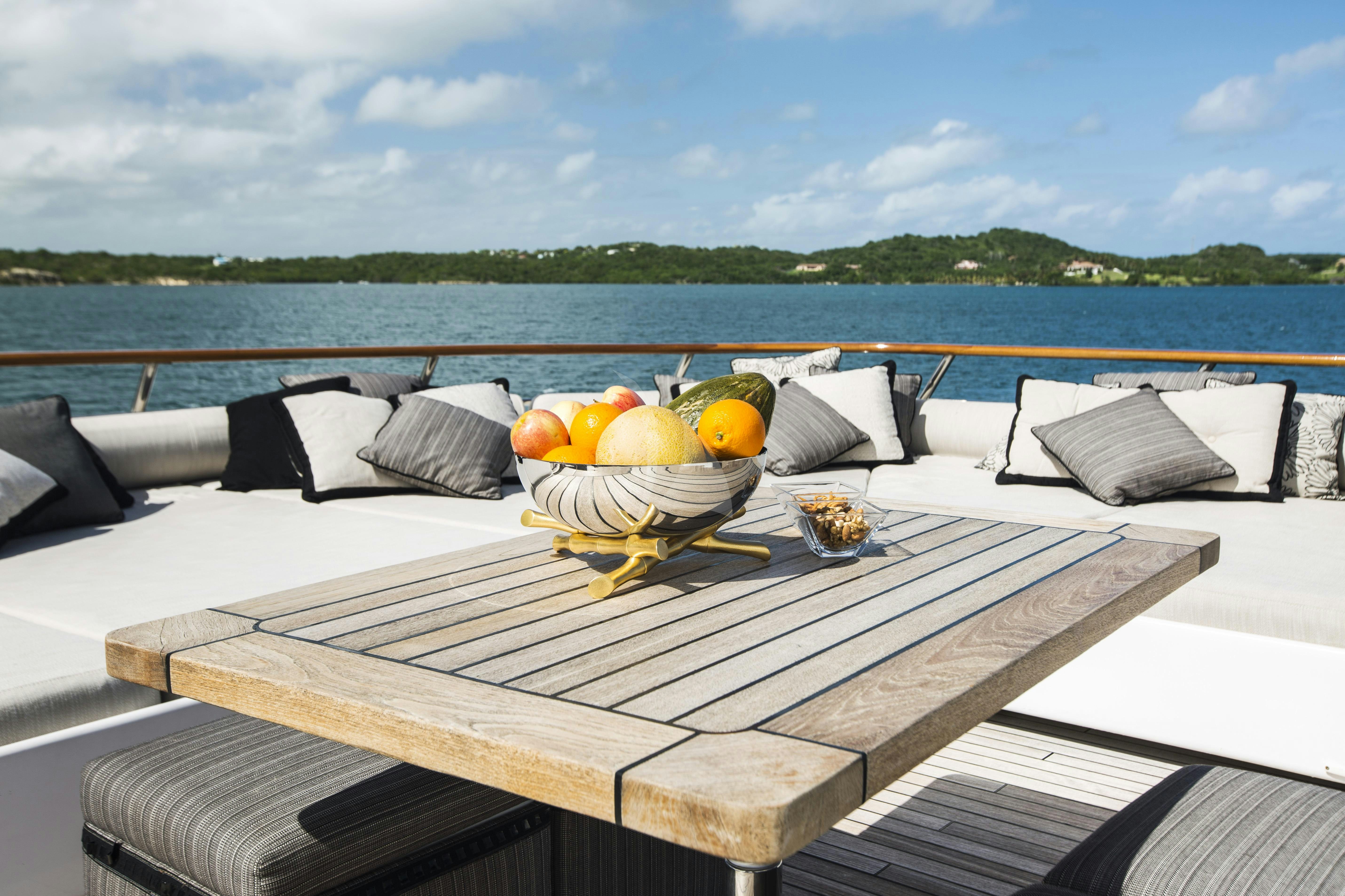 a table with fruit on it aboard SHAKE N' BAKE TBD Yacht for Charter