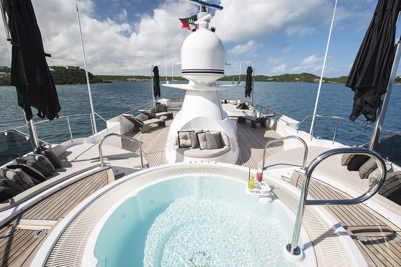 a boat with a water slide aboard SHAKE N' BAKE TBD Yacht for Charter