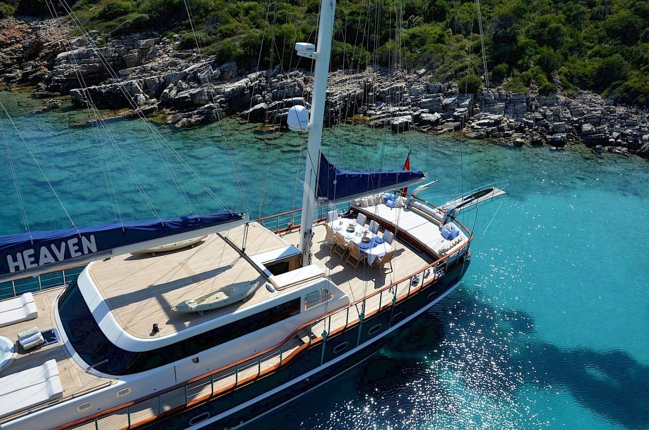 a boat docked at a pier aboard BLUE HEAVEN Yacht for Charter