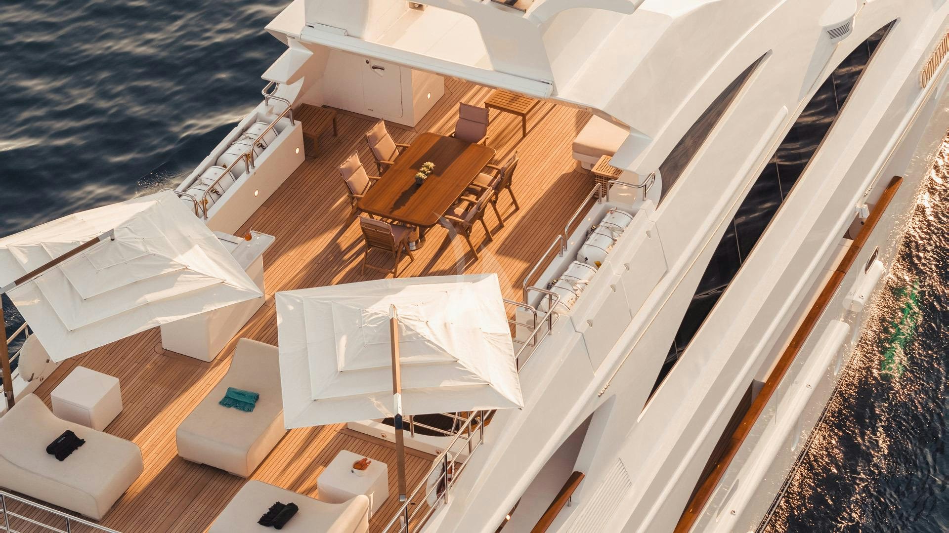 a house with a deck and a pool aboard O'MATHILDE Yacht for Charter