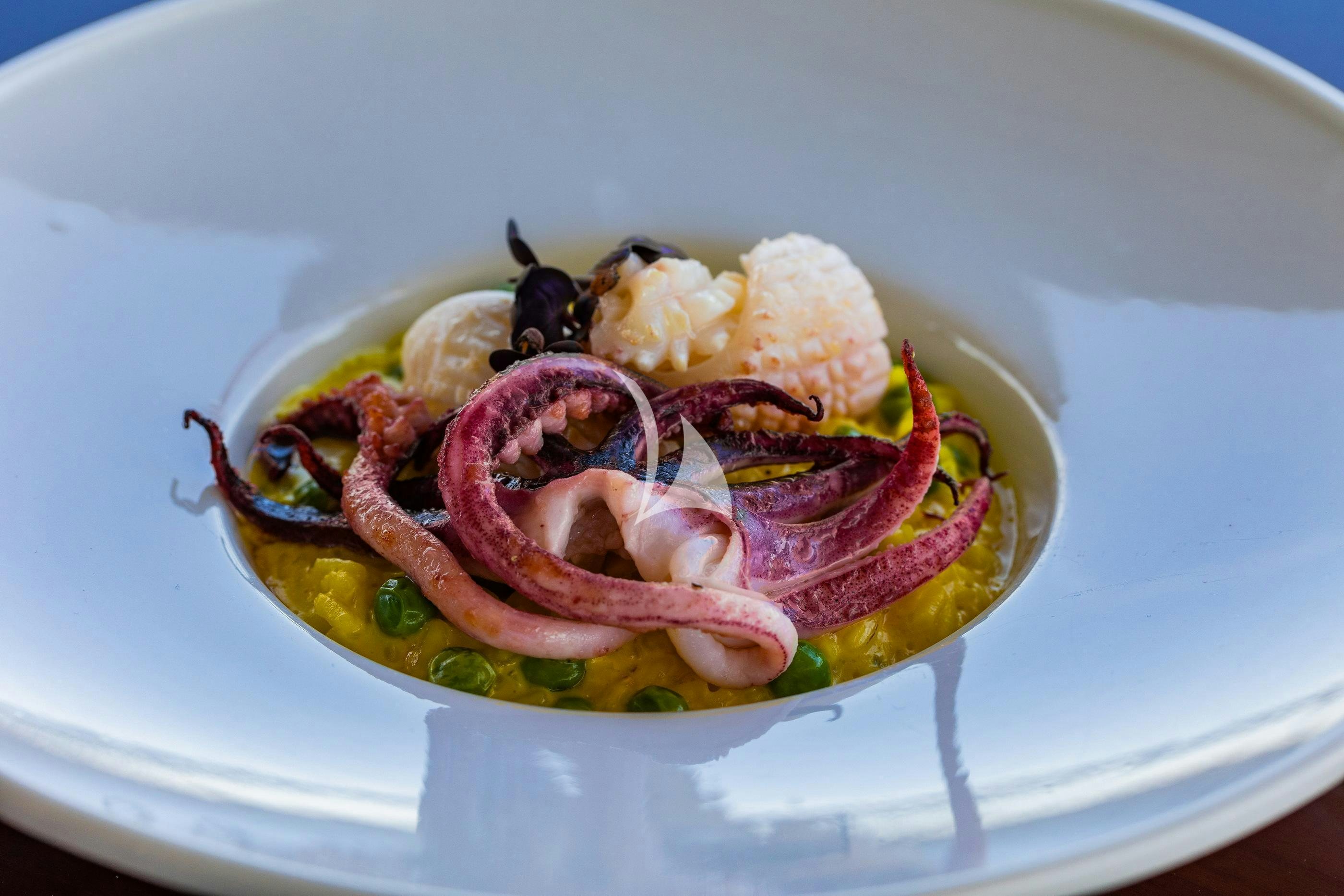 a plate of food aboard NOVELA Yacht for Charter