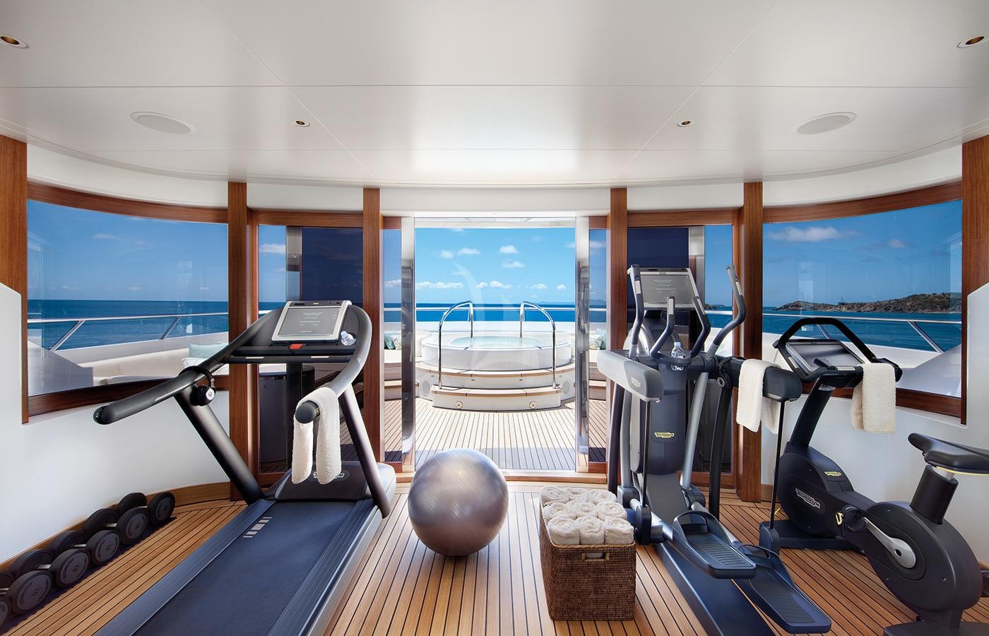 a room with exercise equipment aboard LADY BRITT Yacht for Charter