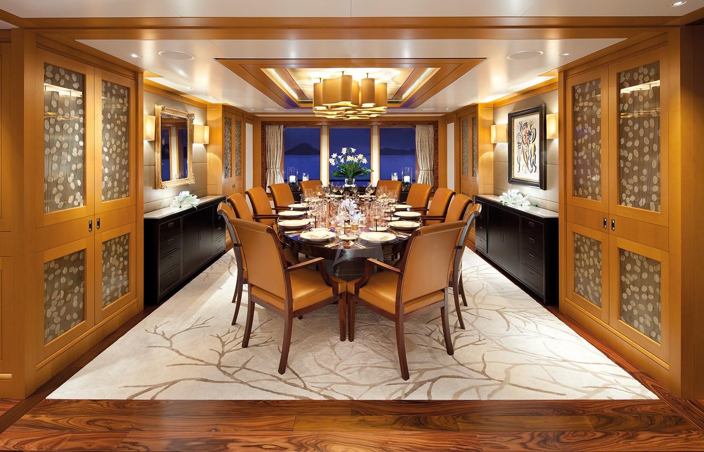 a dining room with a table and chairs aboard LADY BRITT Yacht for Charter