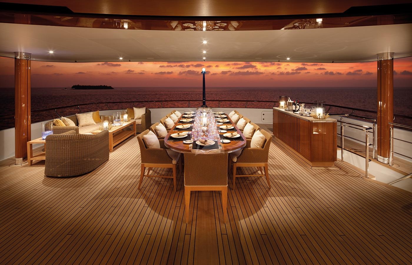 a large room with a table and chairs aboard LADY BRITT Yacht for Charter