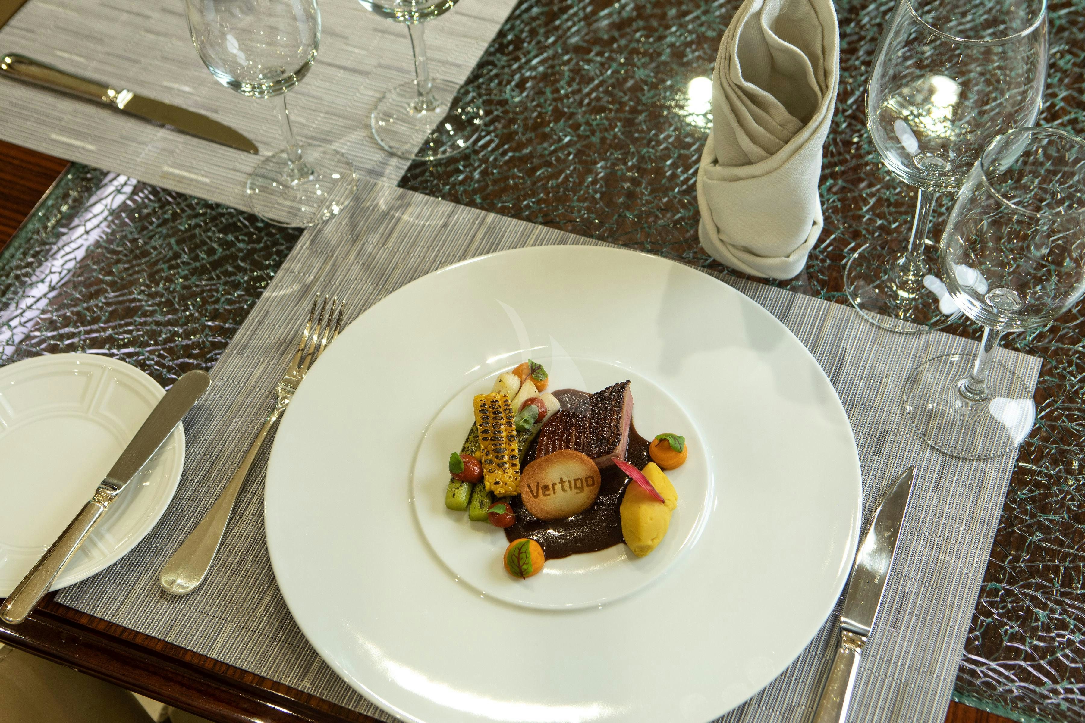 a plate of food aboard VERTIGO Yacht for Charter