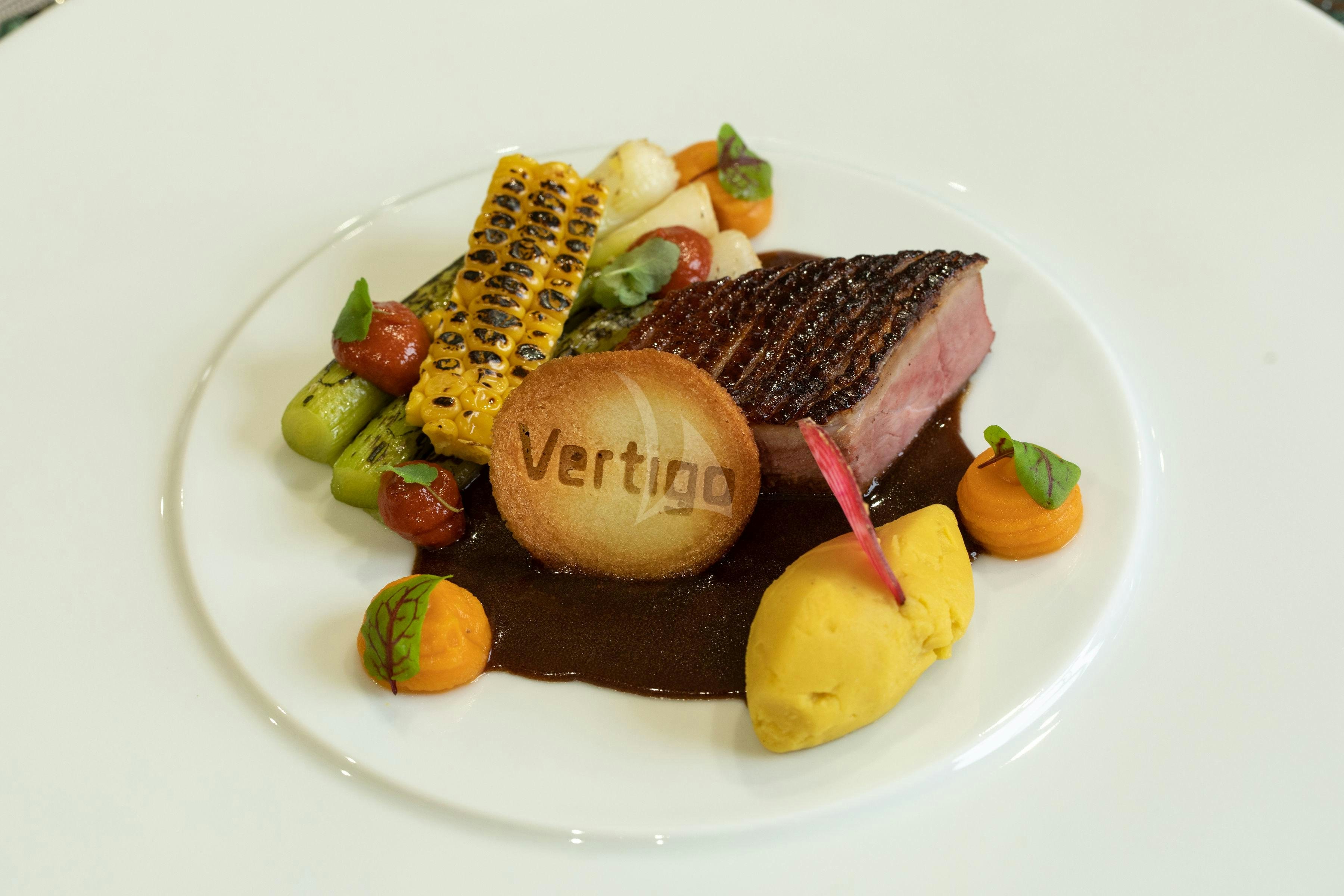 a plate of food aboard VERTIGO Yacht for Charter