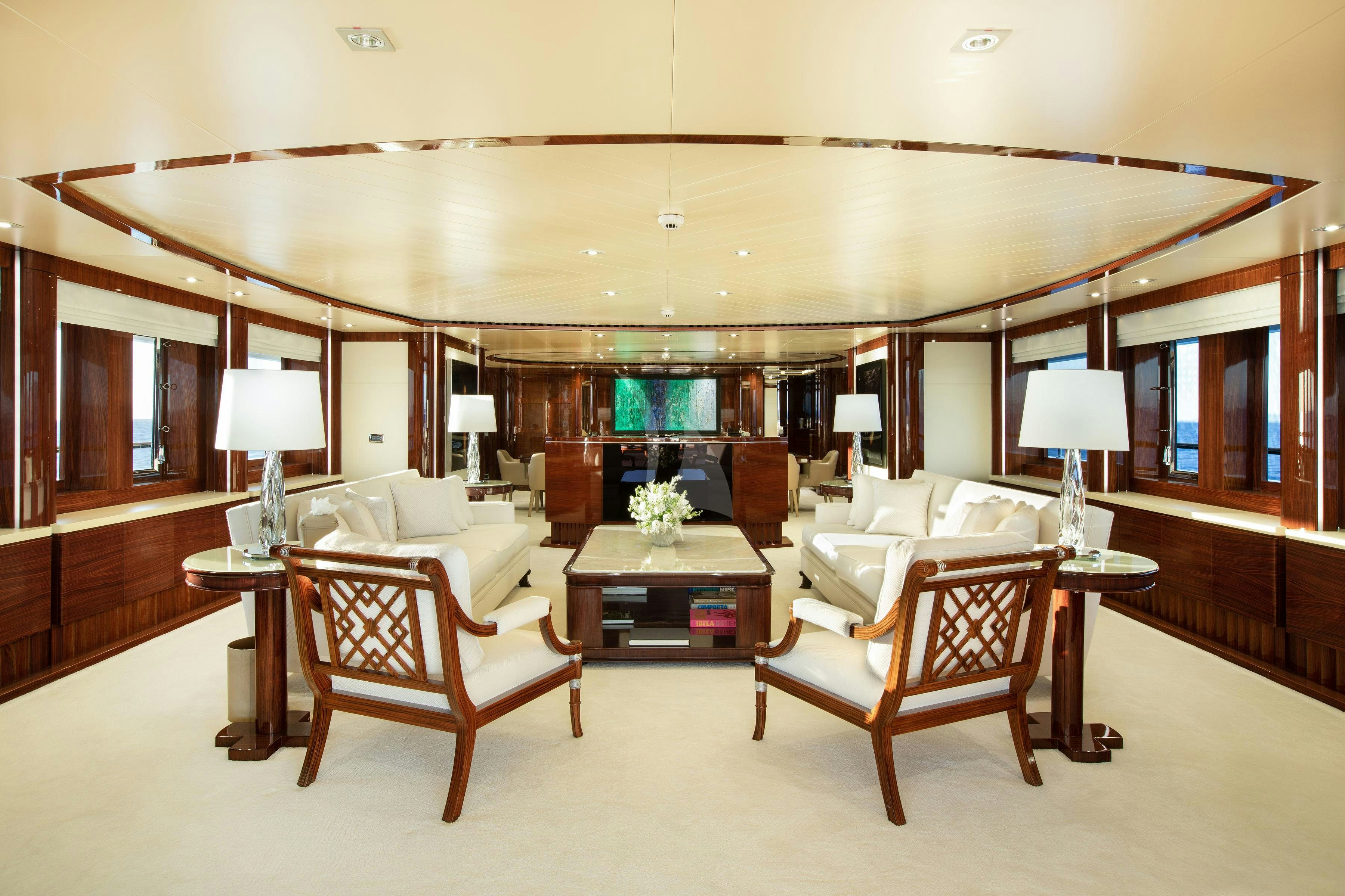a living room with a couch and a table aboard VERTIGO Yacht for Charter