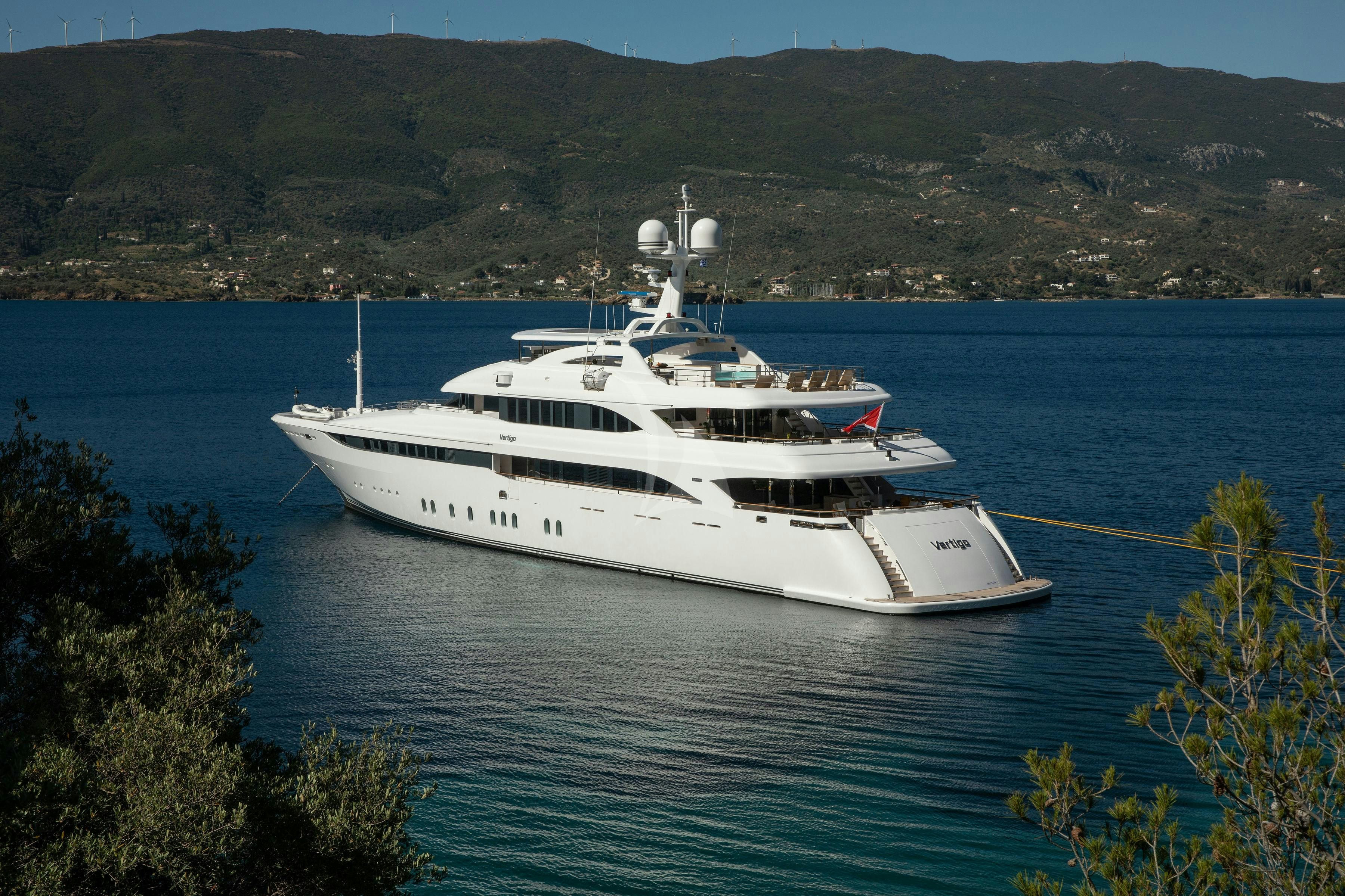 a white yacht in the water aboard VERTIGO Yacht for Charter
