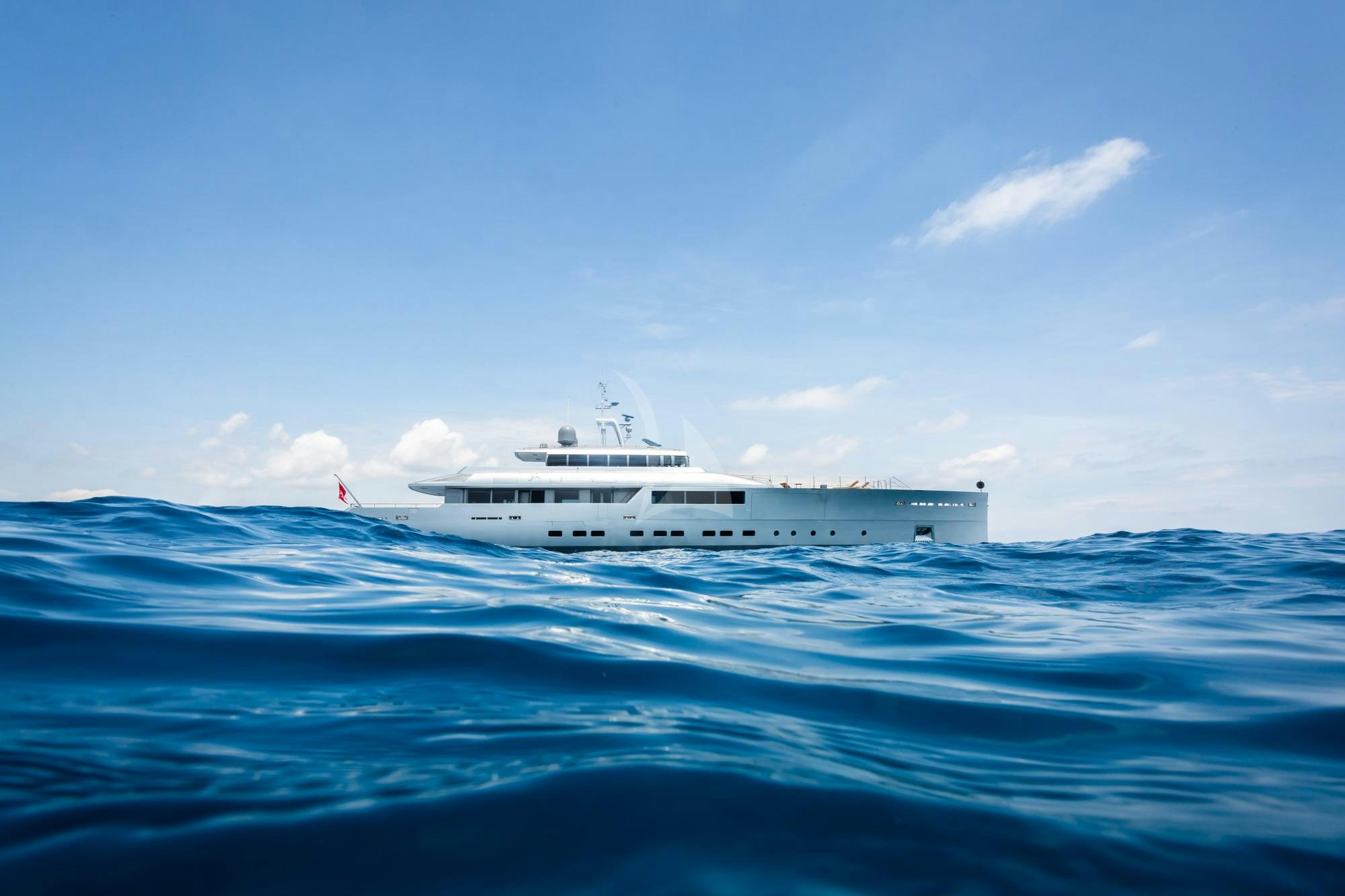 a white yacht in the water aboard FALCO MOSCATA Yacht for Charter