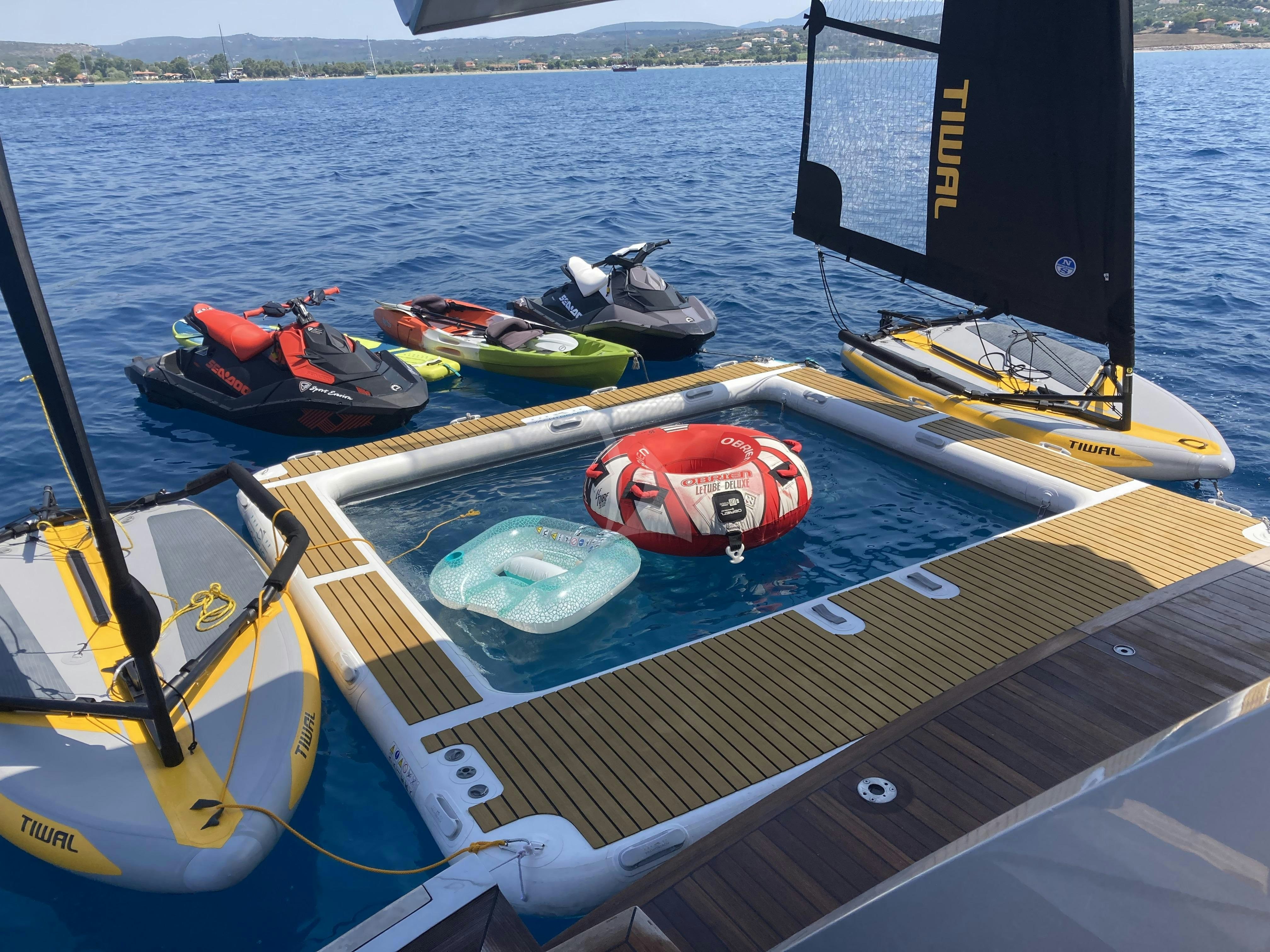 boats on a dock aboard FALCO MOSCATA Yacht for Charter
