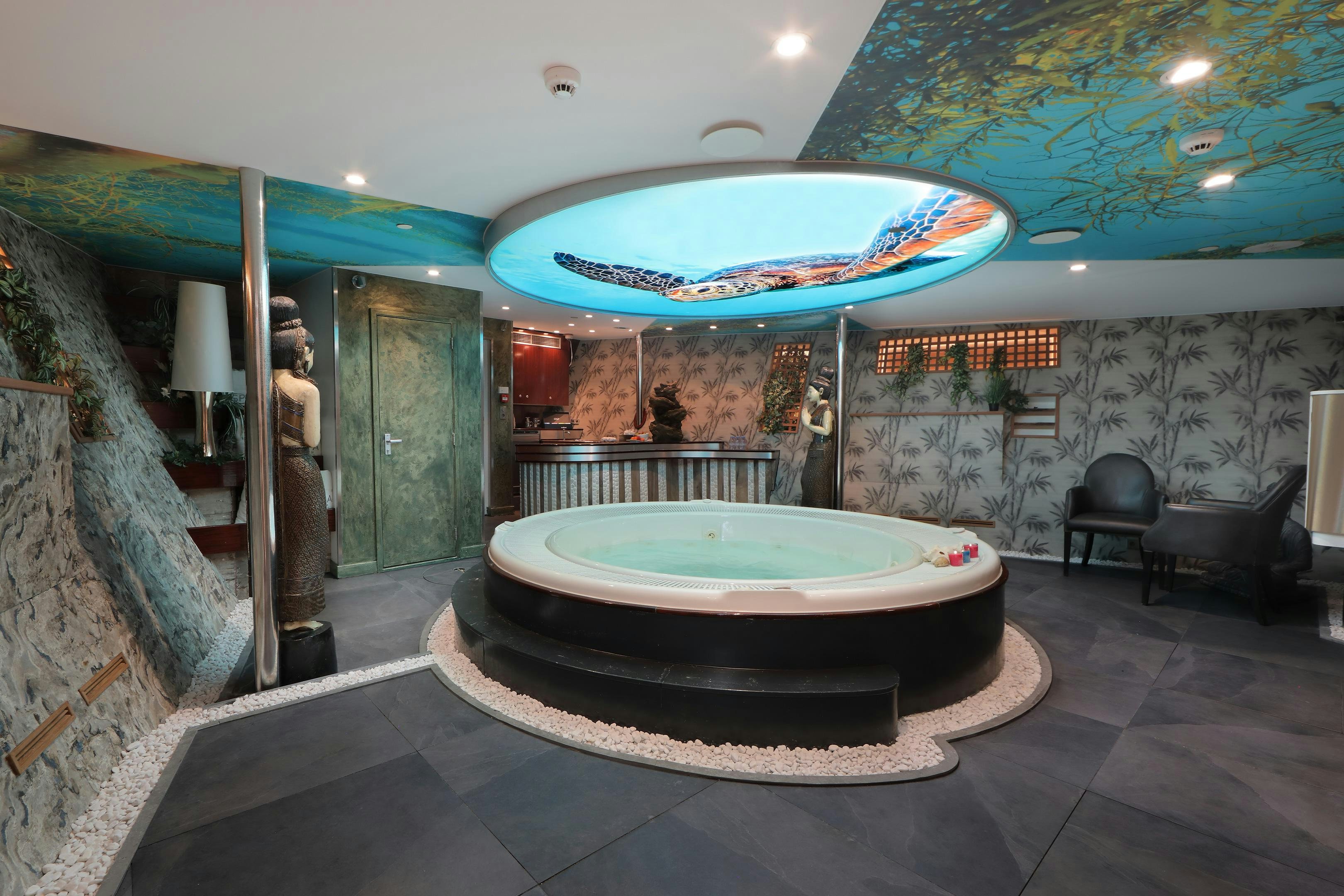 a large indoor swimming pool aboard SHERAKHAN Yacht for Charter