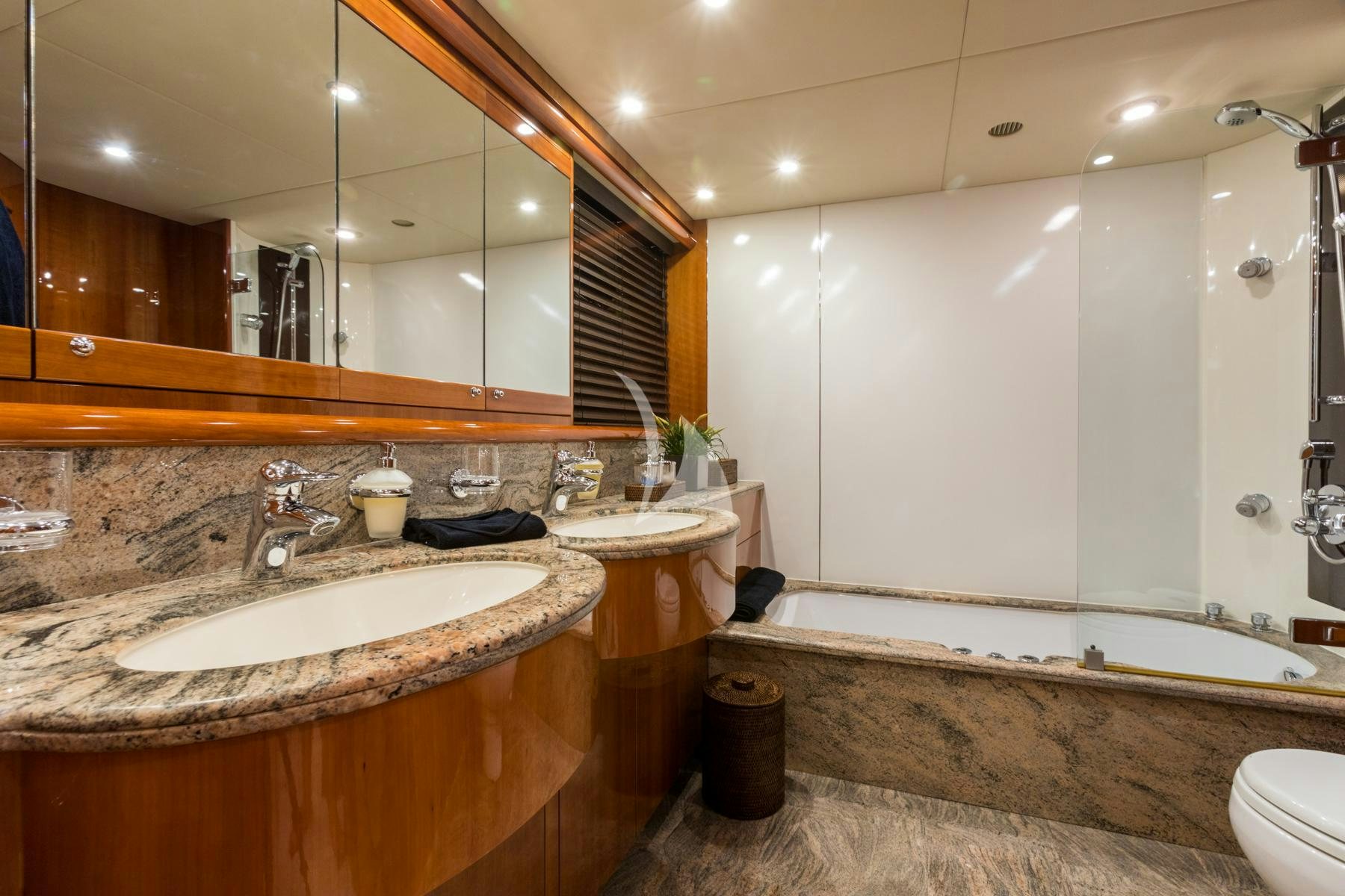 a bathroom with a large mirror aboard WINNING STREAK 2 Yacht for Charter