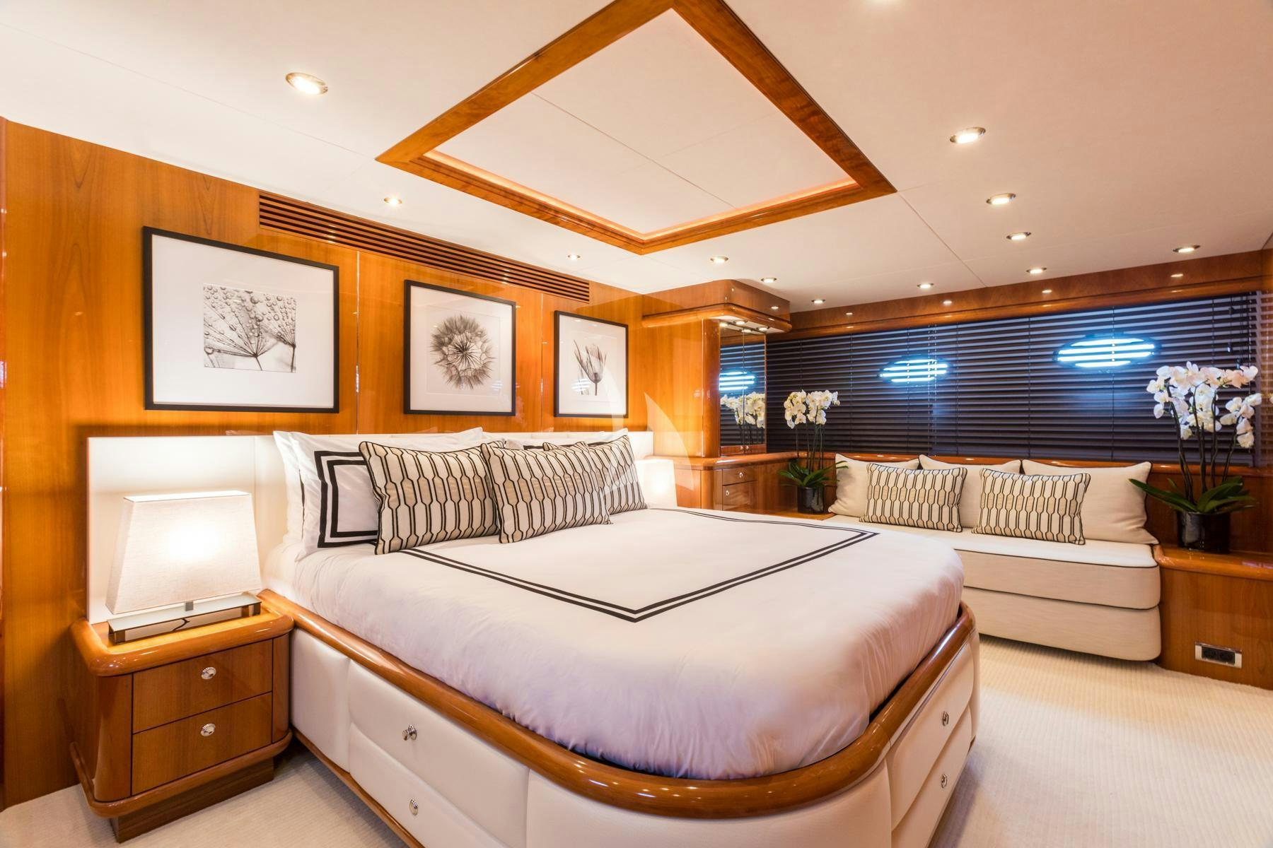 a room with a bed and a tv aboard WINNING STREAK 2 Yacht for Charter