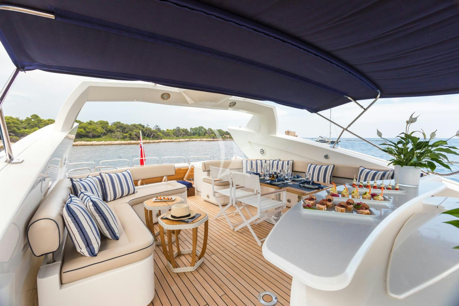 a room with a table and chairs aboard WINNING STREAK 2 Yacht for Charter