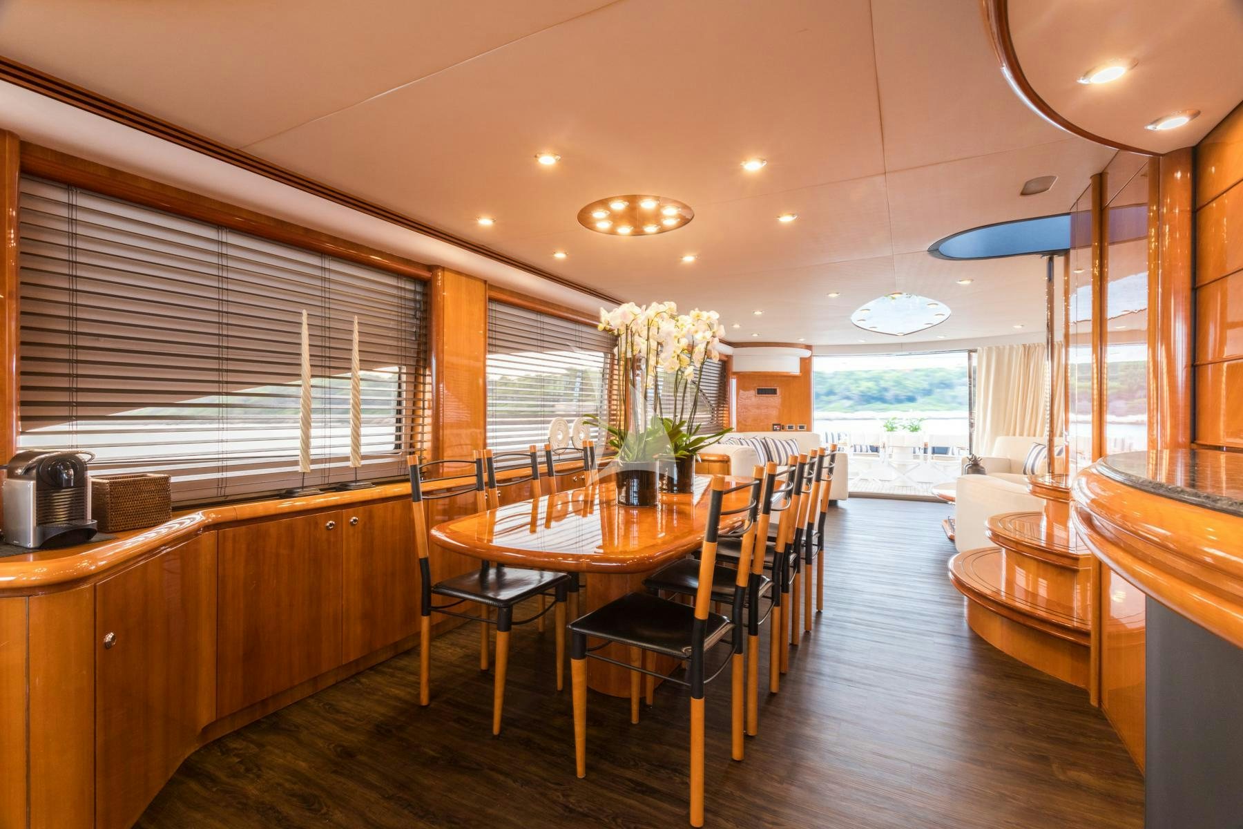a large kitchen with a dining table aboard WINNING STREAK 2 Yacht for Charter