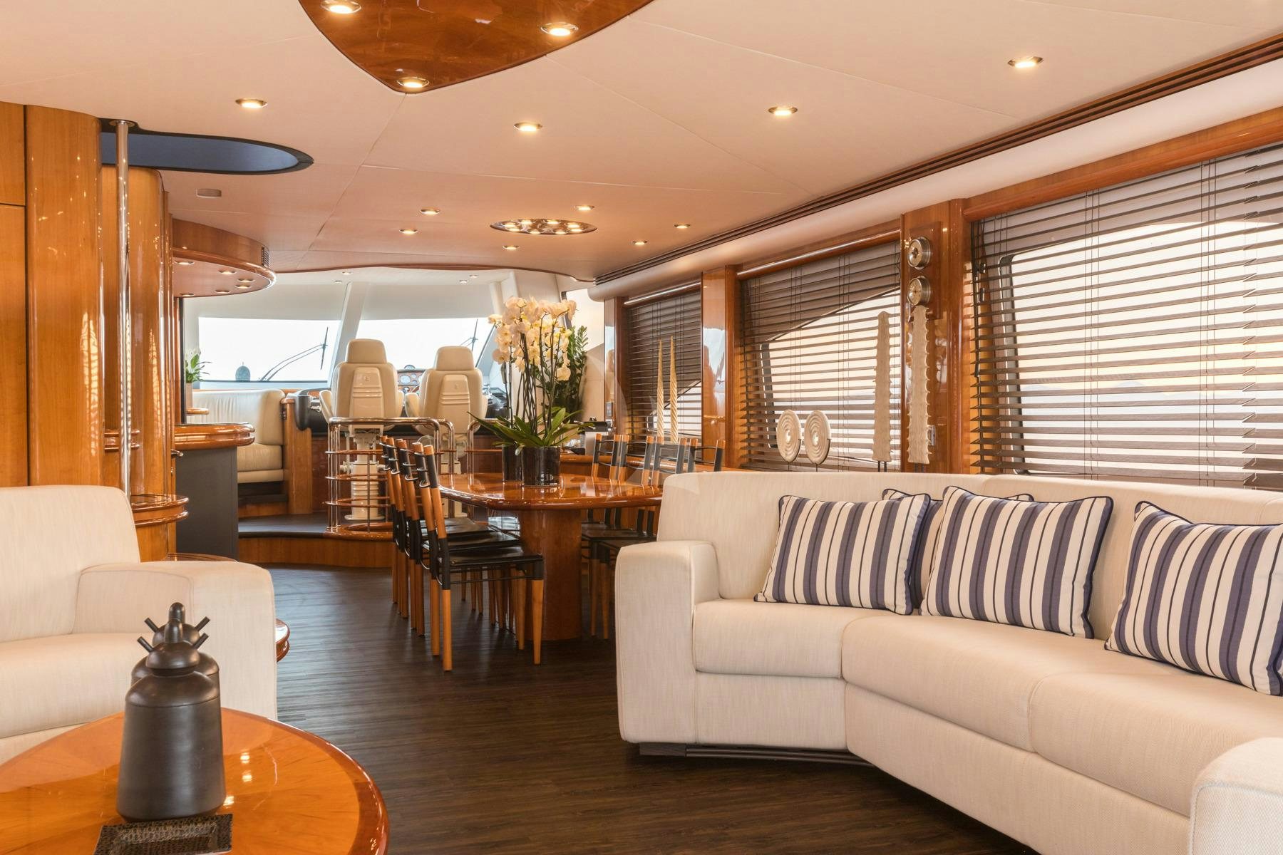 a living room with a couch and a table aboard WINNING STREAK 2 Yacht for Charter