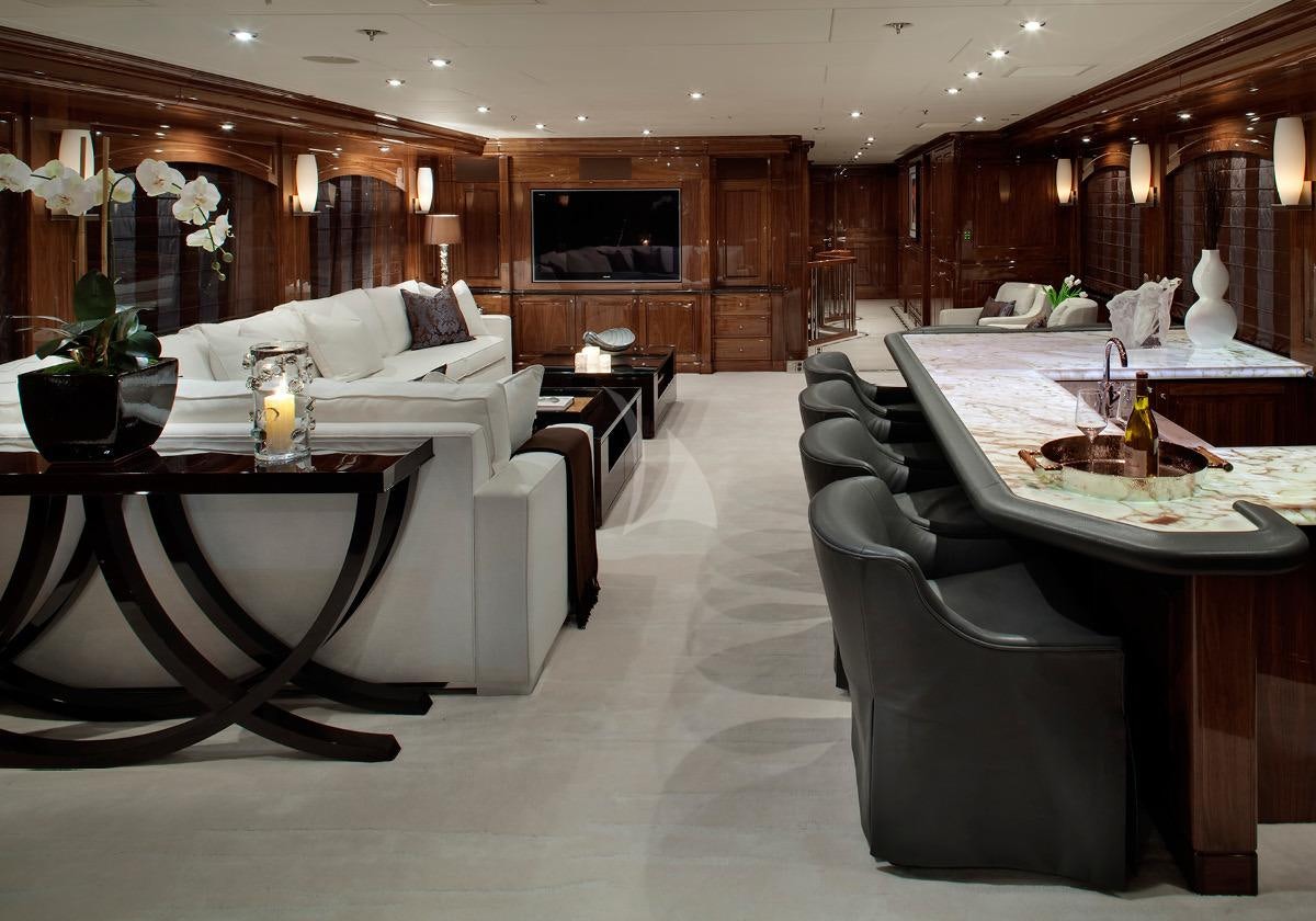 a room with a table and chairs aboard REMEMBER WHEN Yacht for Charter