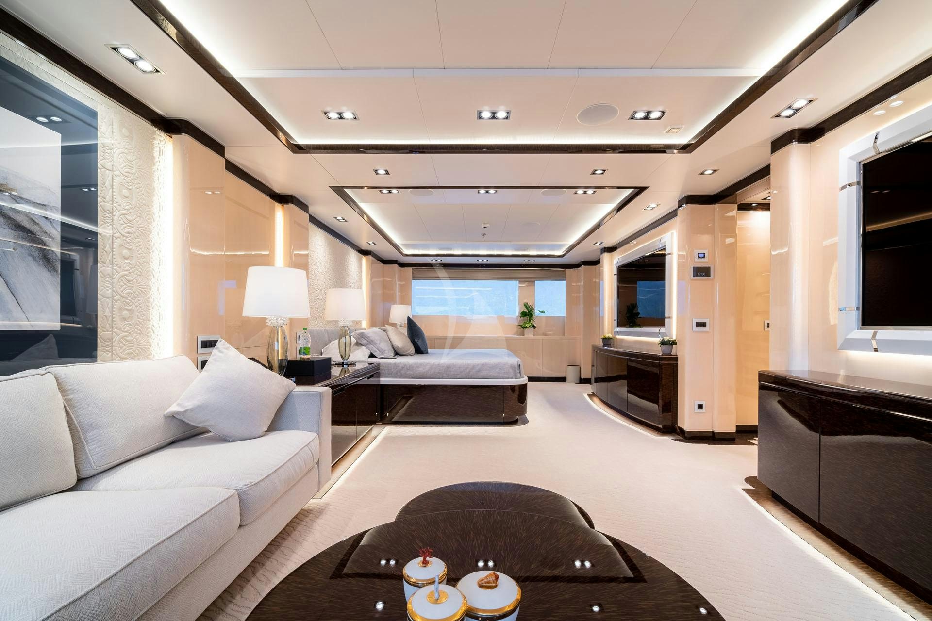 a living room with a large window aboard O'PTASIA Yacht for Charter