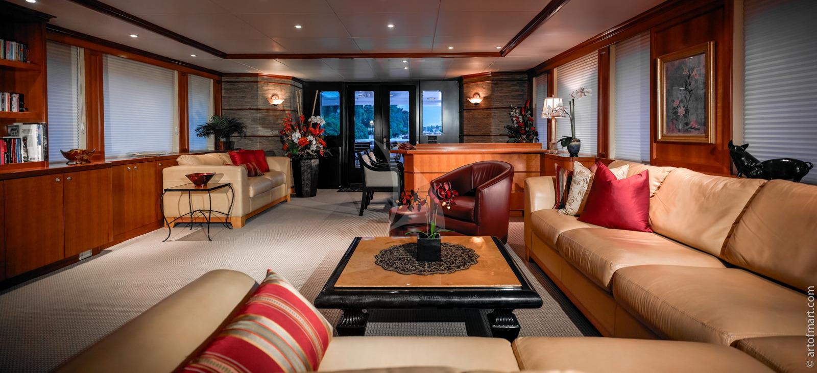 a living room with a couch and a coffee table aboard MURPHY'S LAW Yacht for Charter