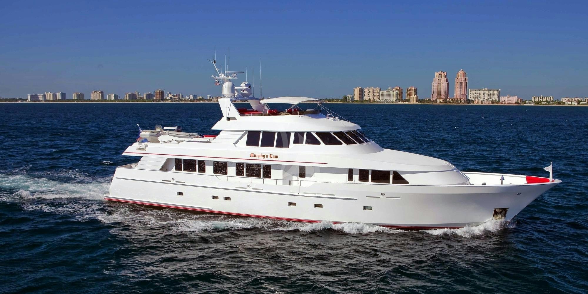 a large white boat in the water aboard MURPHY'S LAW Yacht for Charter