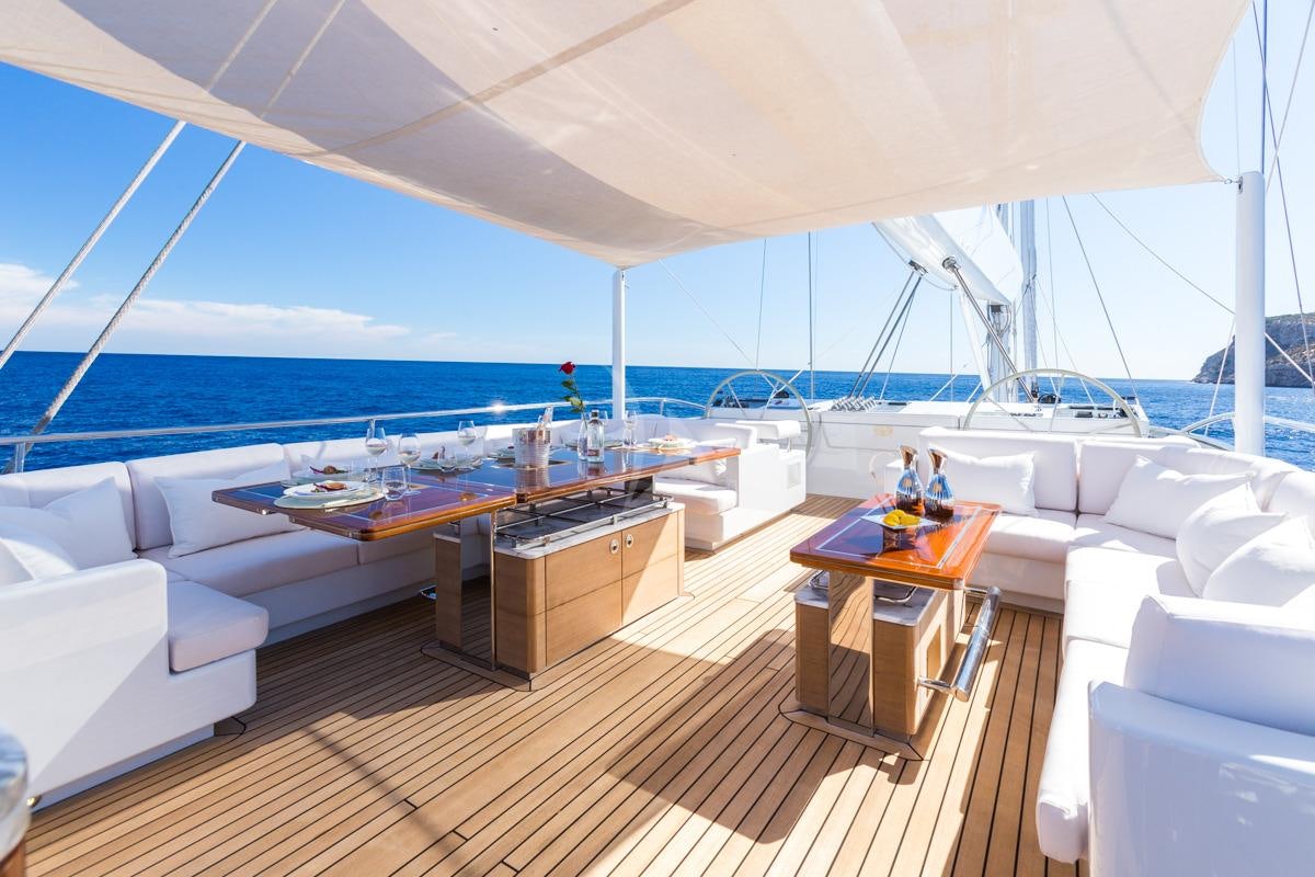 a large room with a large window overlooking the ocean aboard Q Yacht for Charter