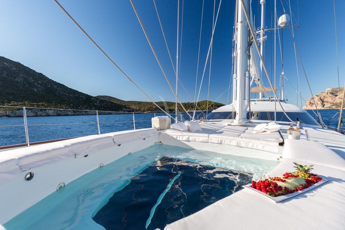 a boat with flowers on the side aboard Q Yacht for Charter