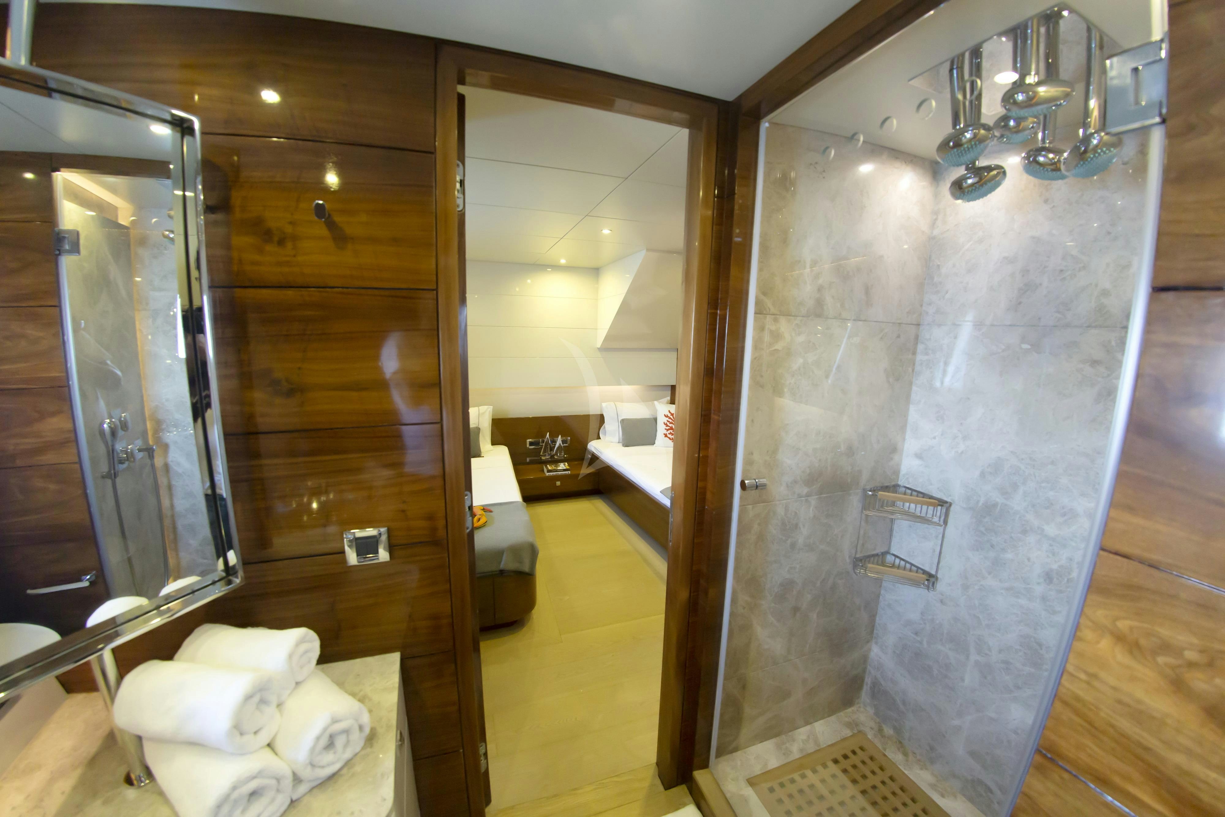 a room with a glass wall aboard MUSIC Yacht for Charter