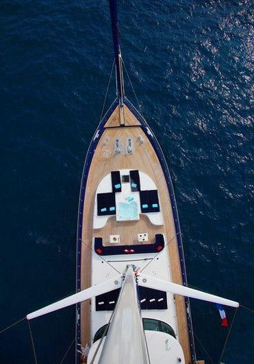 a boat with a tower in the background aboard PERLA DEL MARE Yacht for Charter