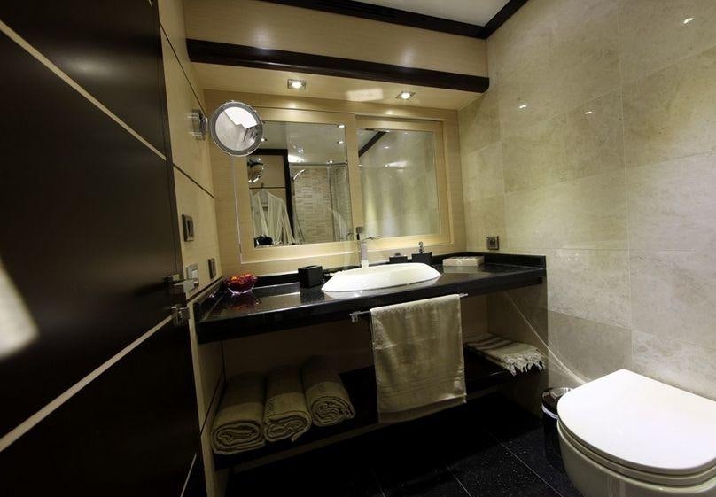 a bathroom with a large mirror aboard PERLA DEL MARE Yacht for Charter