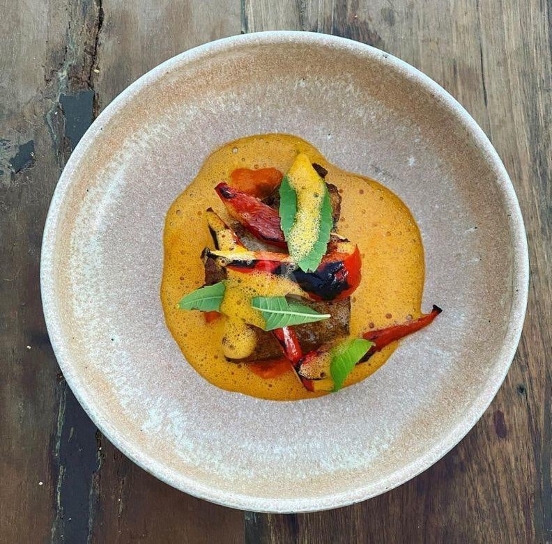 a bowl of soup aboard NELA Yacht for Charter