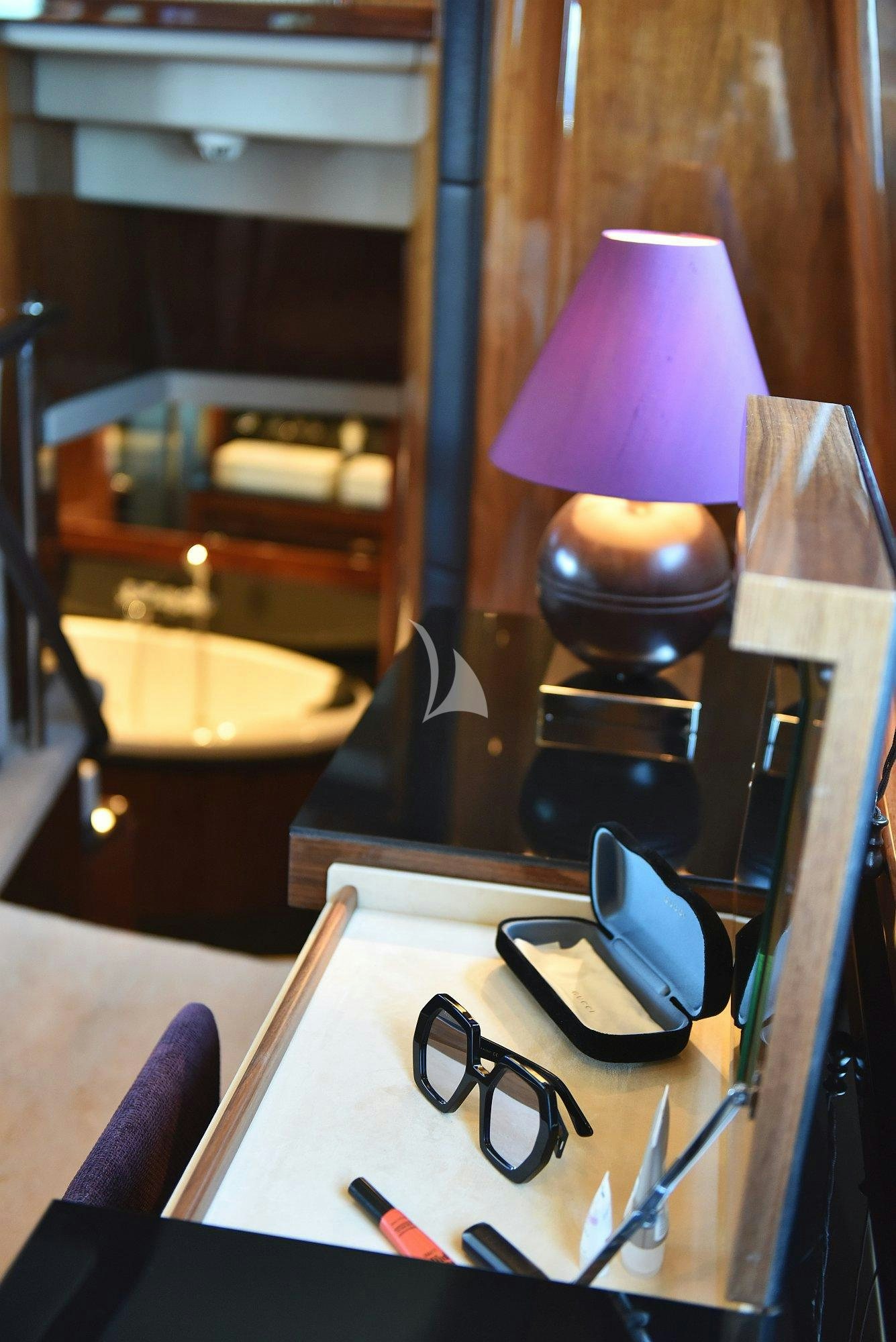 a lamp next to a counter aboard ARAGO Yacht for Charter
