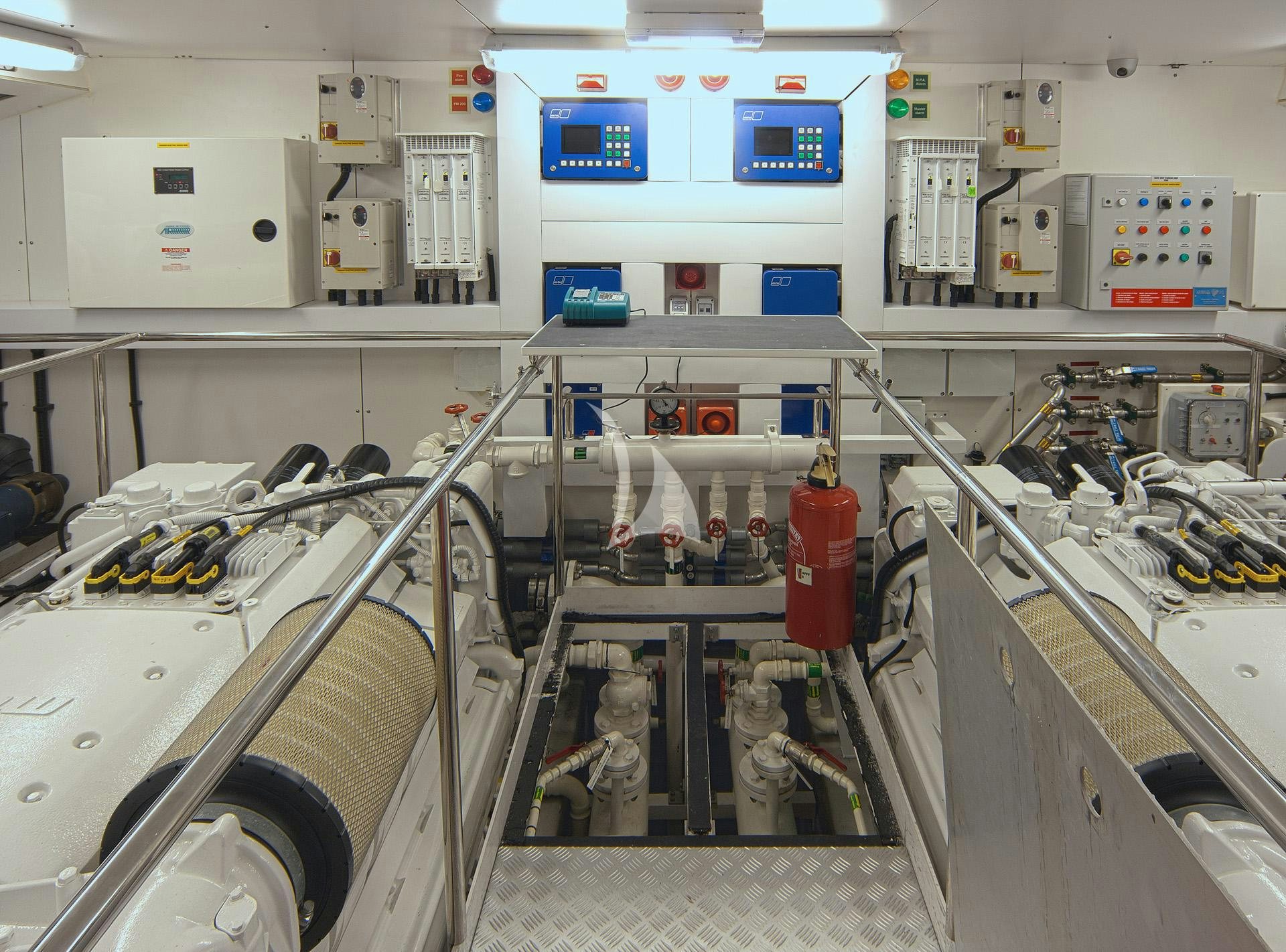 a room with machinery and machinery aboard ARAGO Yacht for Charter