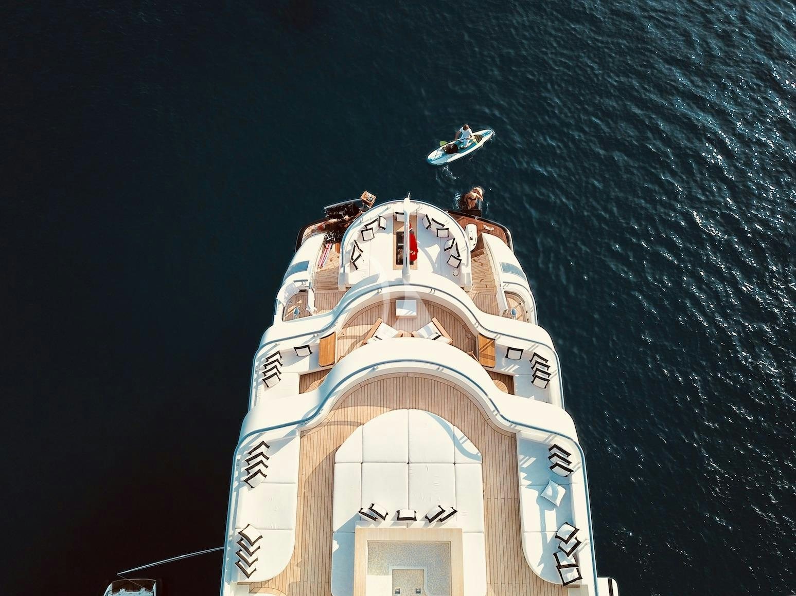 a clock on a tower aboard LIQUID SKY Yacht for Charter