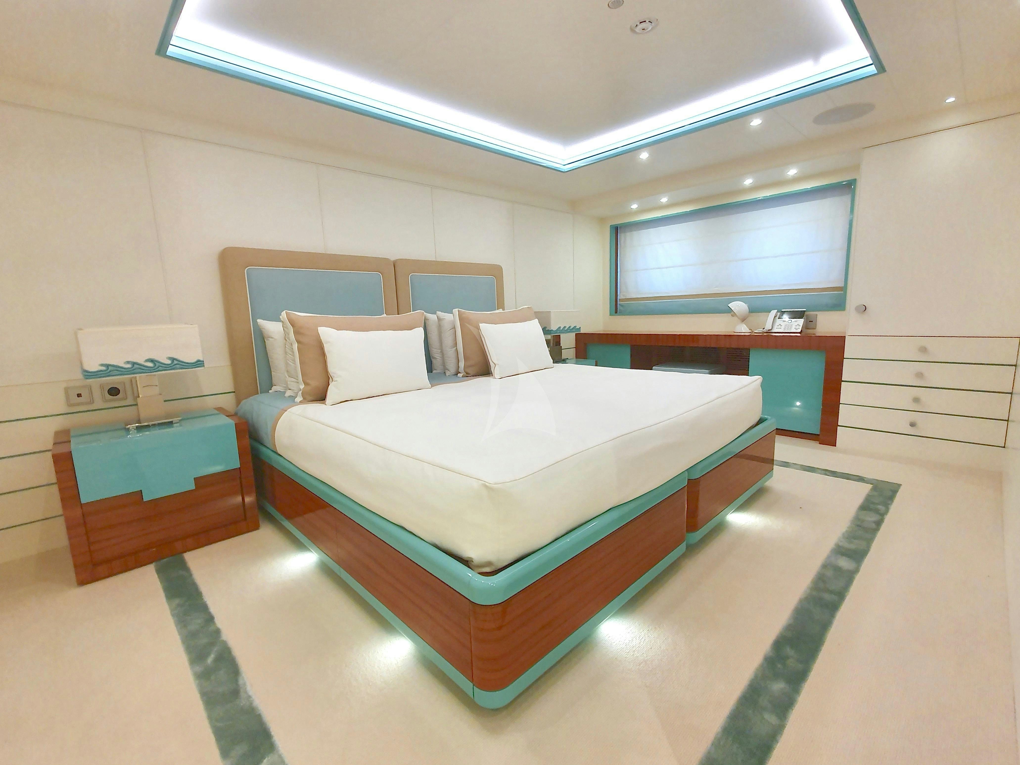 a room with a bed and a window aboard MIMTEE Yacht for Charter