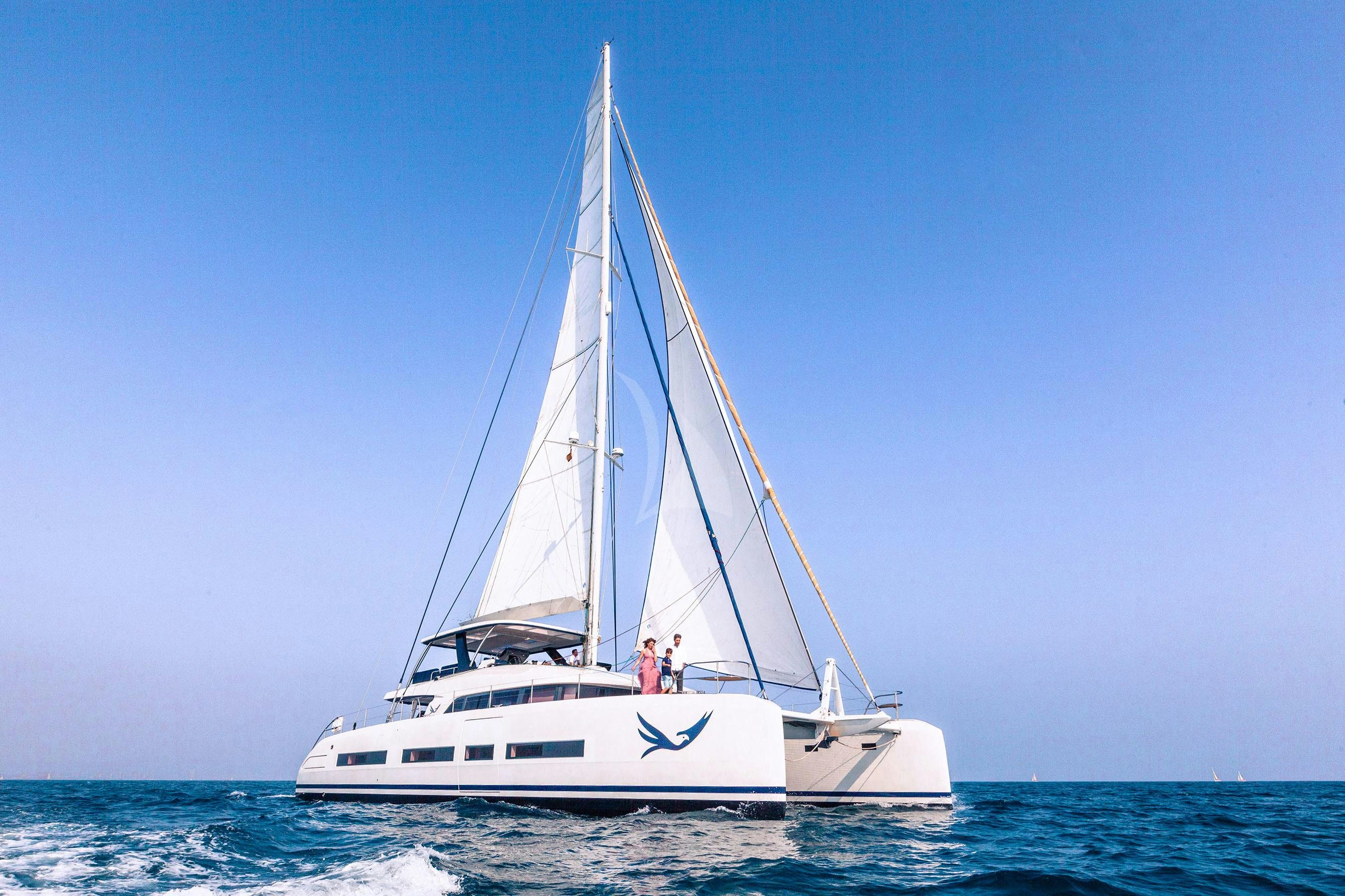 a white boat in the water aboard MARIAH PRINCESS III Yacht for Charter