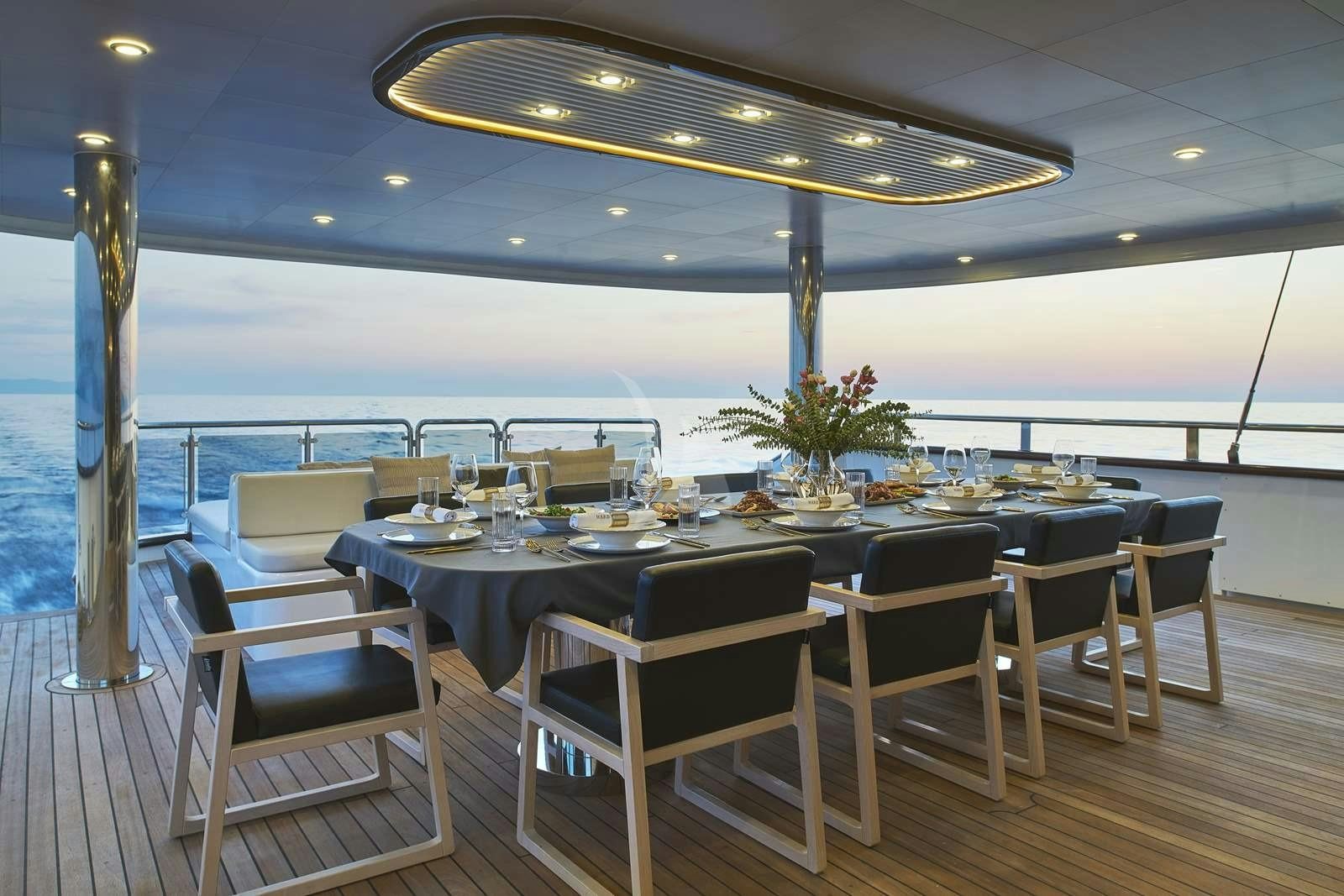 a table set for a meal aboard ANIMA MARIS Yacht for Charter