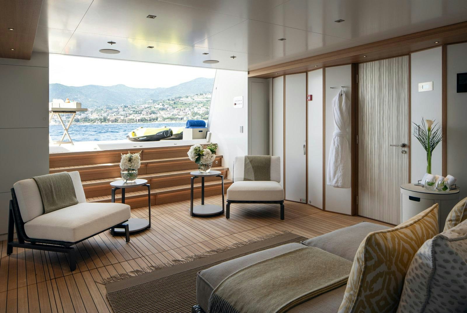 a living room with a large window aboard MOSKITO Yacht for Charter
