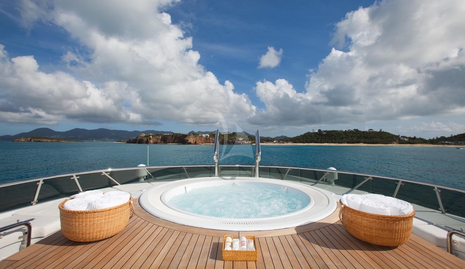 a couple of baskets on a deck overlooking a body of water aboard FRIENDSHIP Yacht for Charter