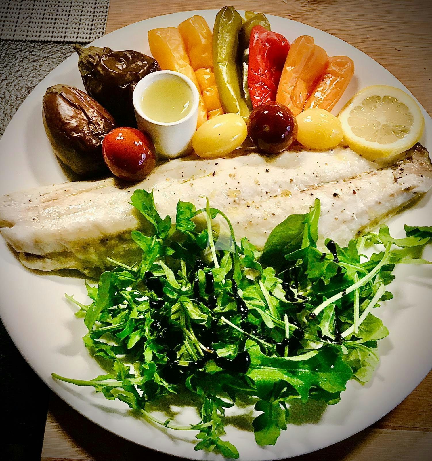 a plate of food aboard EPIC Yacht for Charter