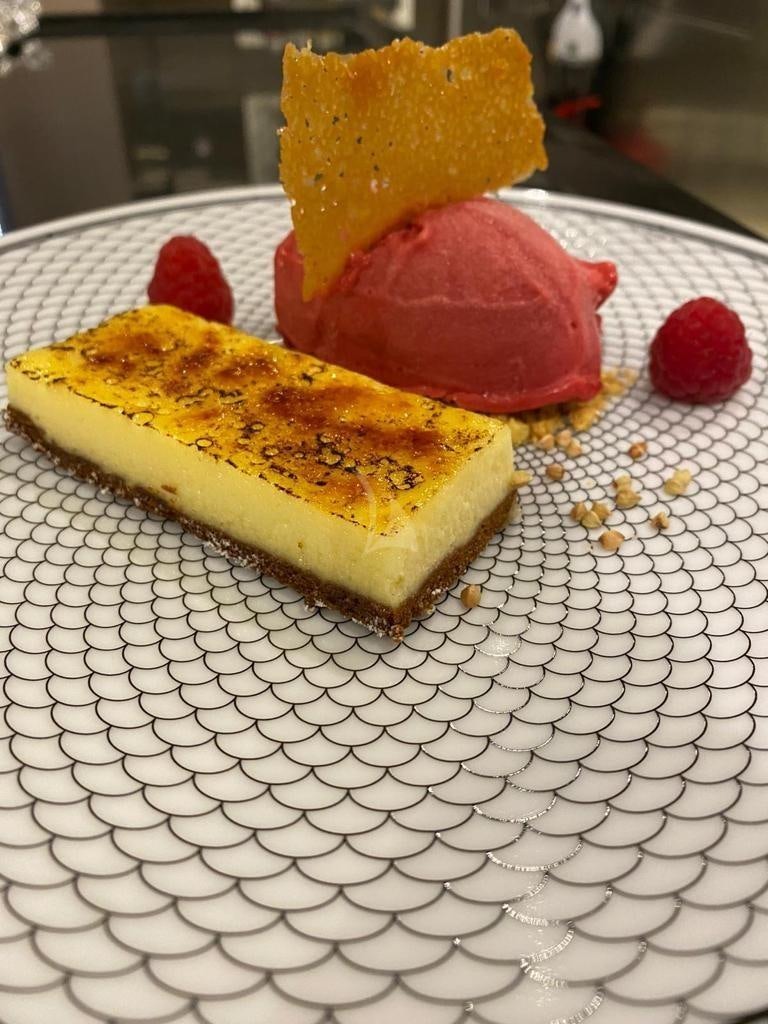 a cake on a table aboard LEL Yacht for Charter